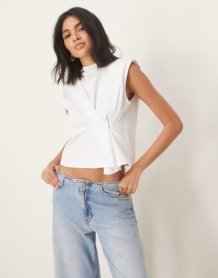 ASOS DESIGN cinched sleeveless top with grown on neck and shoulder pads in ecru-White | ASOS (Global)