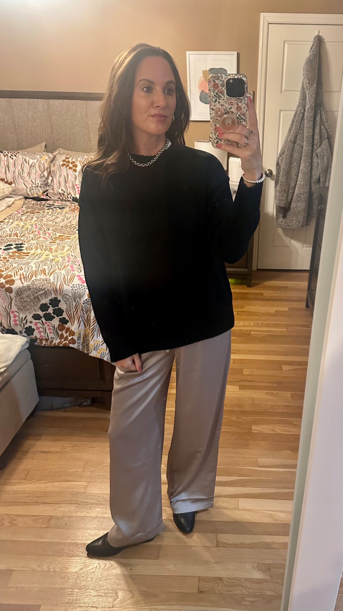 Office #OOTD - I got these #satinpants from #Uniqlo recently and I’m a fan! Super comfortable and can be dressed up or down. Also wearing the Gap sweater everyone got their hands on this year! A classic closet staple 🩶🖤

#LTKFindsUnder100 #LTKStyleTip #LTKWorkwear