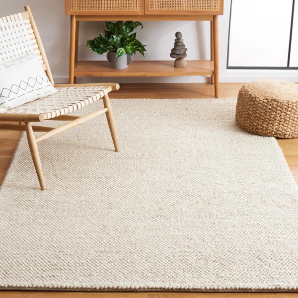 Almus Solid Color Handmade Tufted Area Rug in Beige/Ivory | Wayfair North America