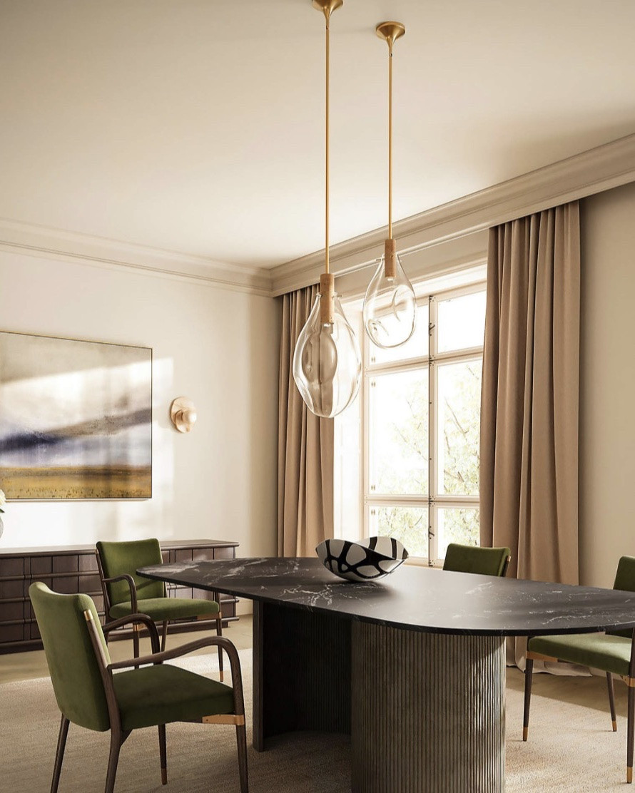This gorgeous dining table is Dark, sultry and sleek. The metal fluted base and black and white marble oval top give drama and elegance with a soft subtle beauty.

#LTKHome
