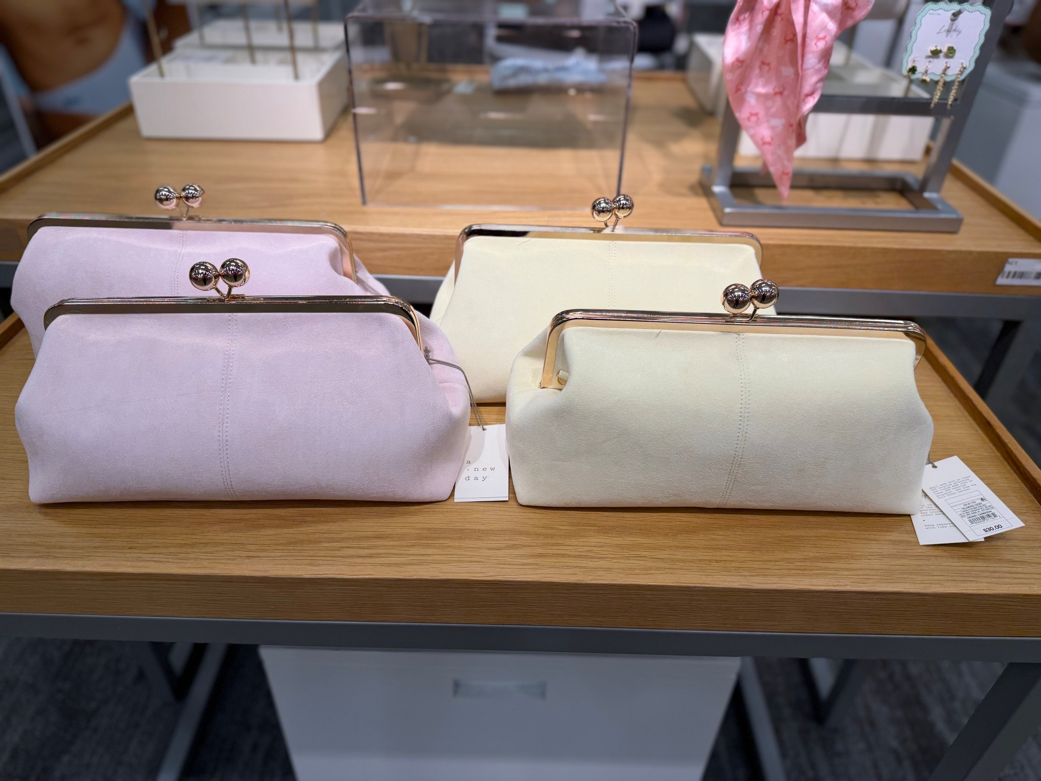 My favorite clutch in spring colors! They both came home with me. Pro tip: Spray with scotch guard to keep them looking new. ✔️😉🙌

#LTKootd #LTKmomlife #LTKdayinmylife