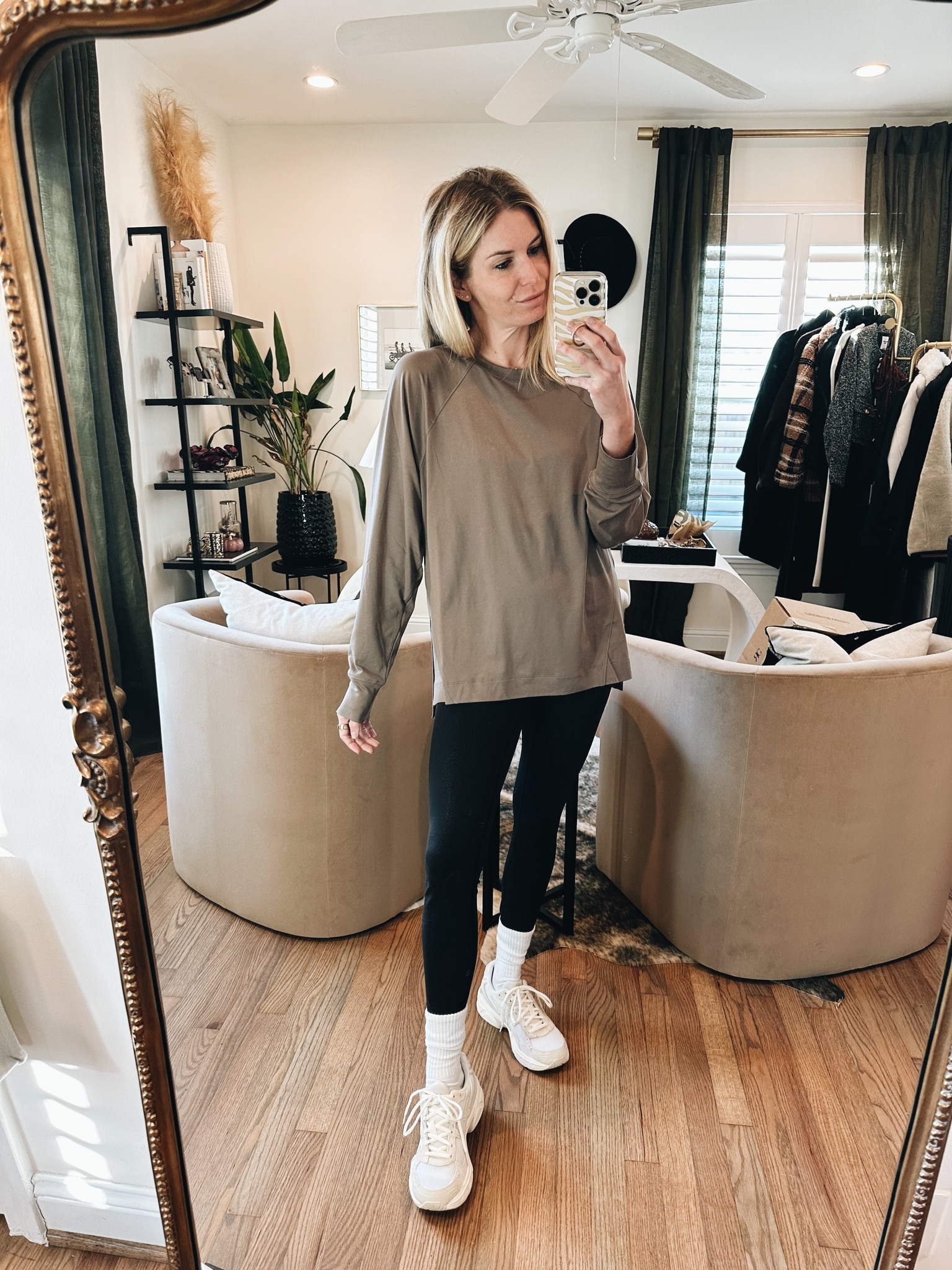 Easy Saturday lounge look 🤍 soft long sleeve t-shirt, black leggings and ASIC sneakers  

#LTKfindsunder100 #LTKfitness #LTKshoecrush