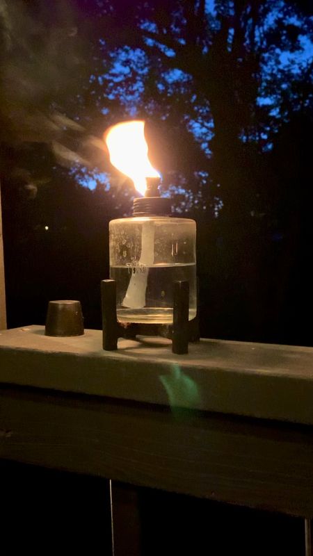 I love this tabletop tiki torch. Adds ambiance while helping keep the bugs away. 

#LTKSeasonal #LTKhome