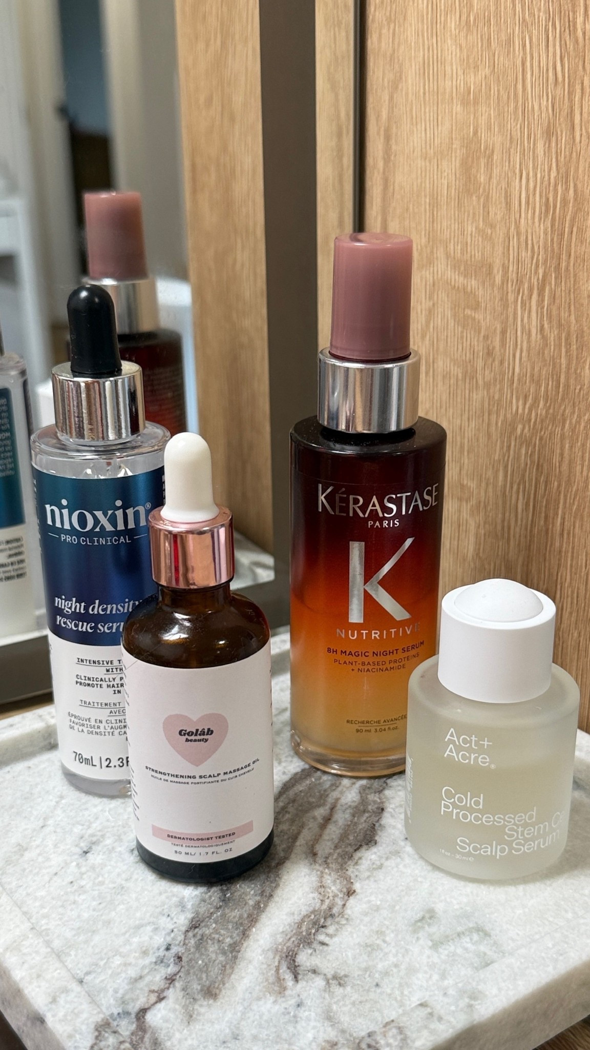 Only started this about a month ago but I have been obsessed with using the two serums every other night. Oil before wash day once a week and then the Kerastase serum goes on my mids to ends, I just scrunch it in!

#LTKBeauty