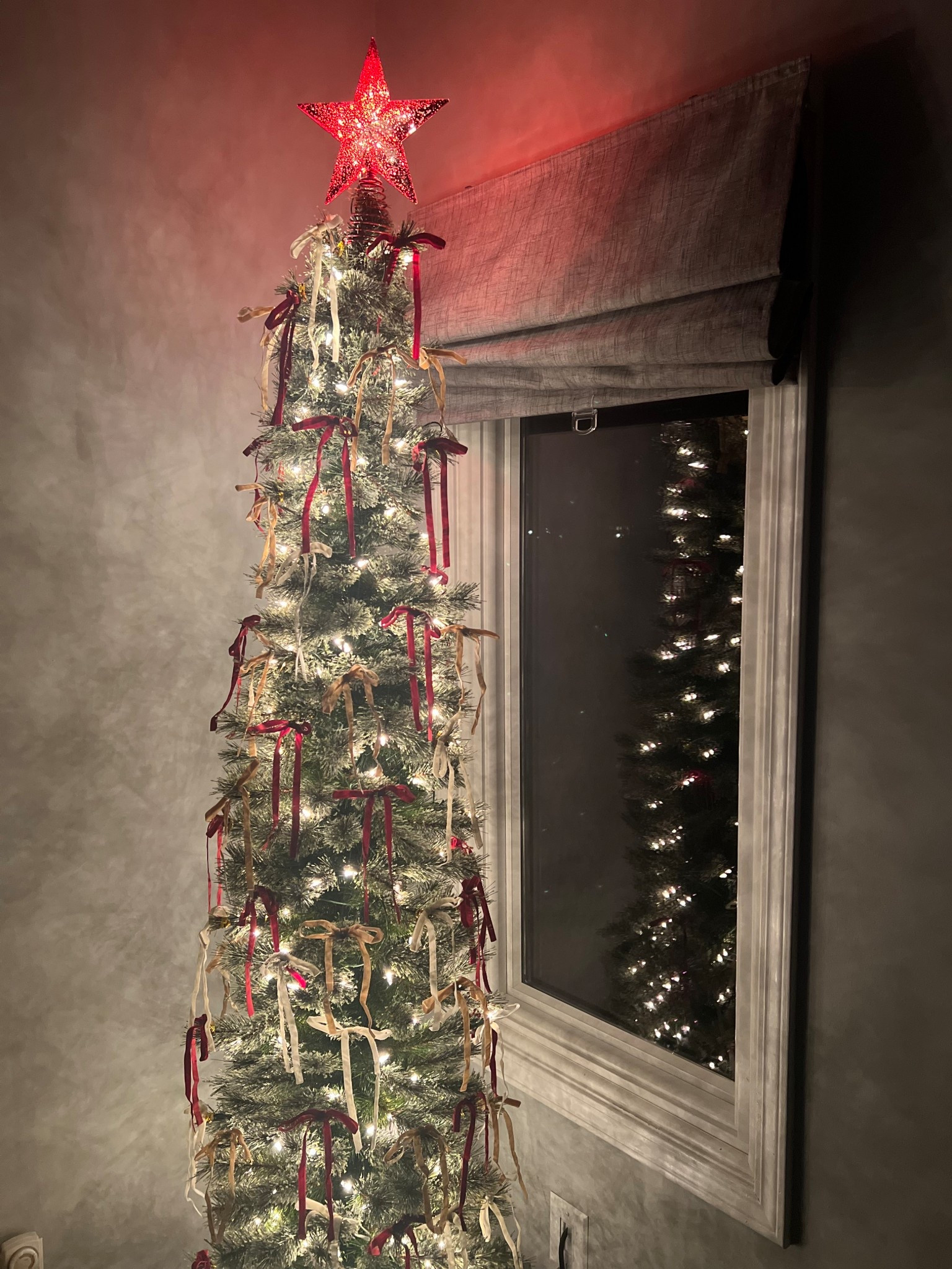 Such an easy add to elevate a pencil tree. I love it!! #christmastree #holidaydecor #decorating #diy #chritmasmagic 

#LTKHoliday #LTKCyberWeek #LTKmomlife