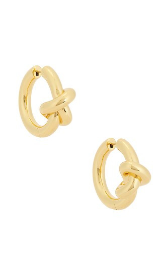Jennifer Fisher Knot Huggies in Metallic Gold. | Revolve Clothing (Global)
