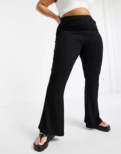 ASOS DESIGN Curve kick flare pants in black | ASOS (Global)