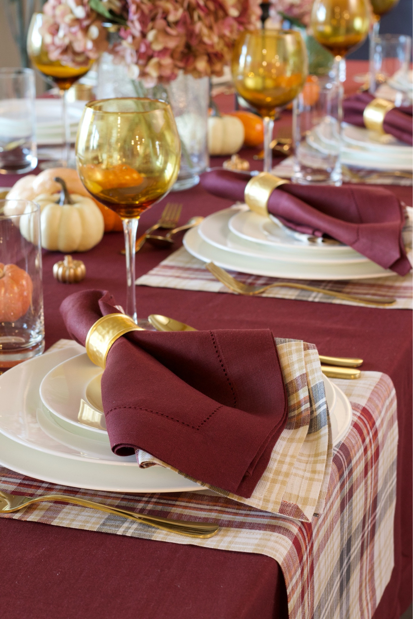 Christmas Tablescapes. Table. Christmas table. Napkins. Plaid napkins. Rings napkins. Table setting. Placemats. Cooper wine glasses 

#LTKSeasonal #LTKHoliday #LTKGiftGuide