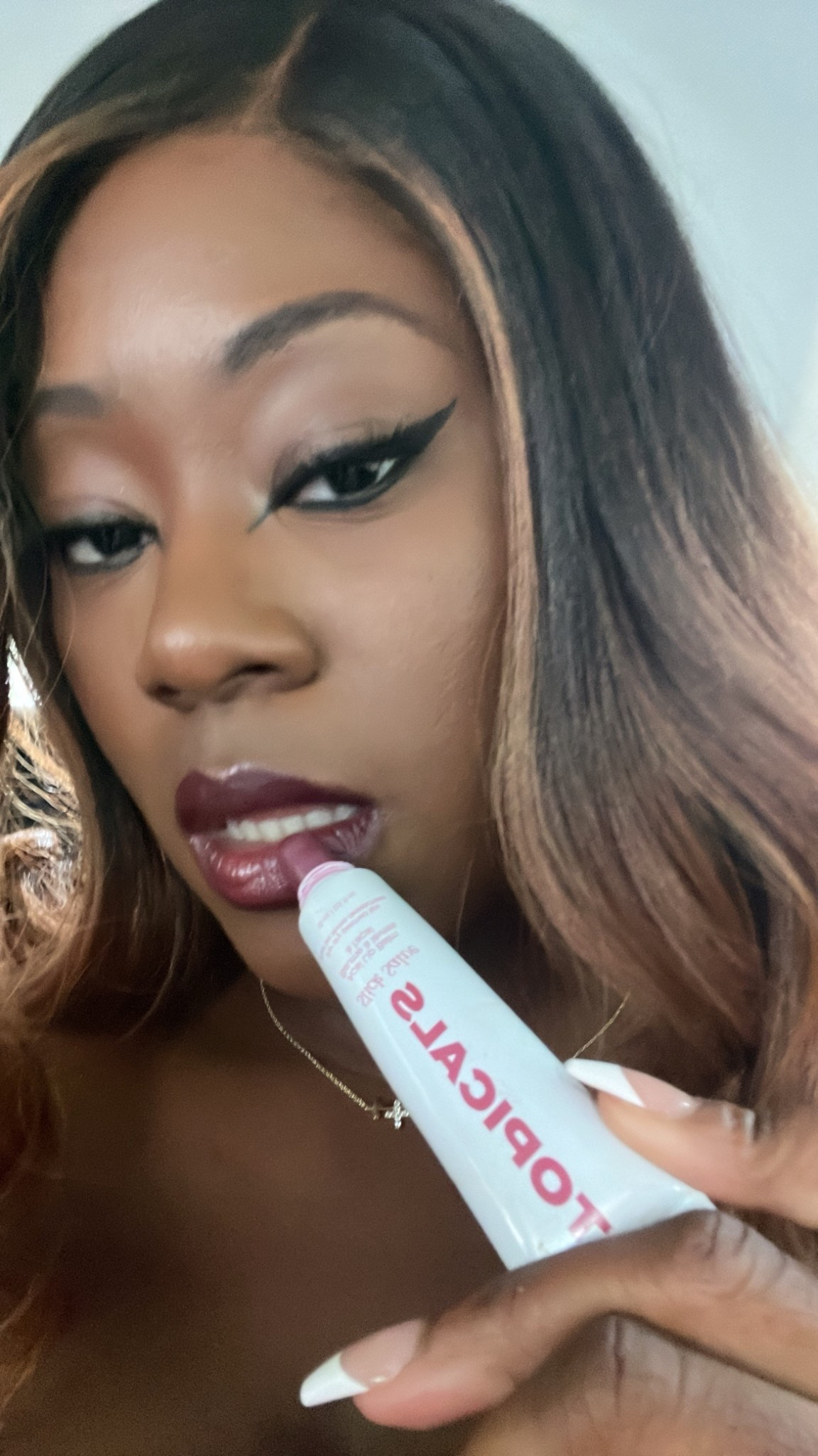 Thanksgiving dinner proof lipgloss. Topicals Açaí Slick Salve protects your lip combo 

#LTKBeauty #LTKGiftGuide #LTKCyberWeek