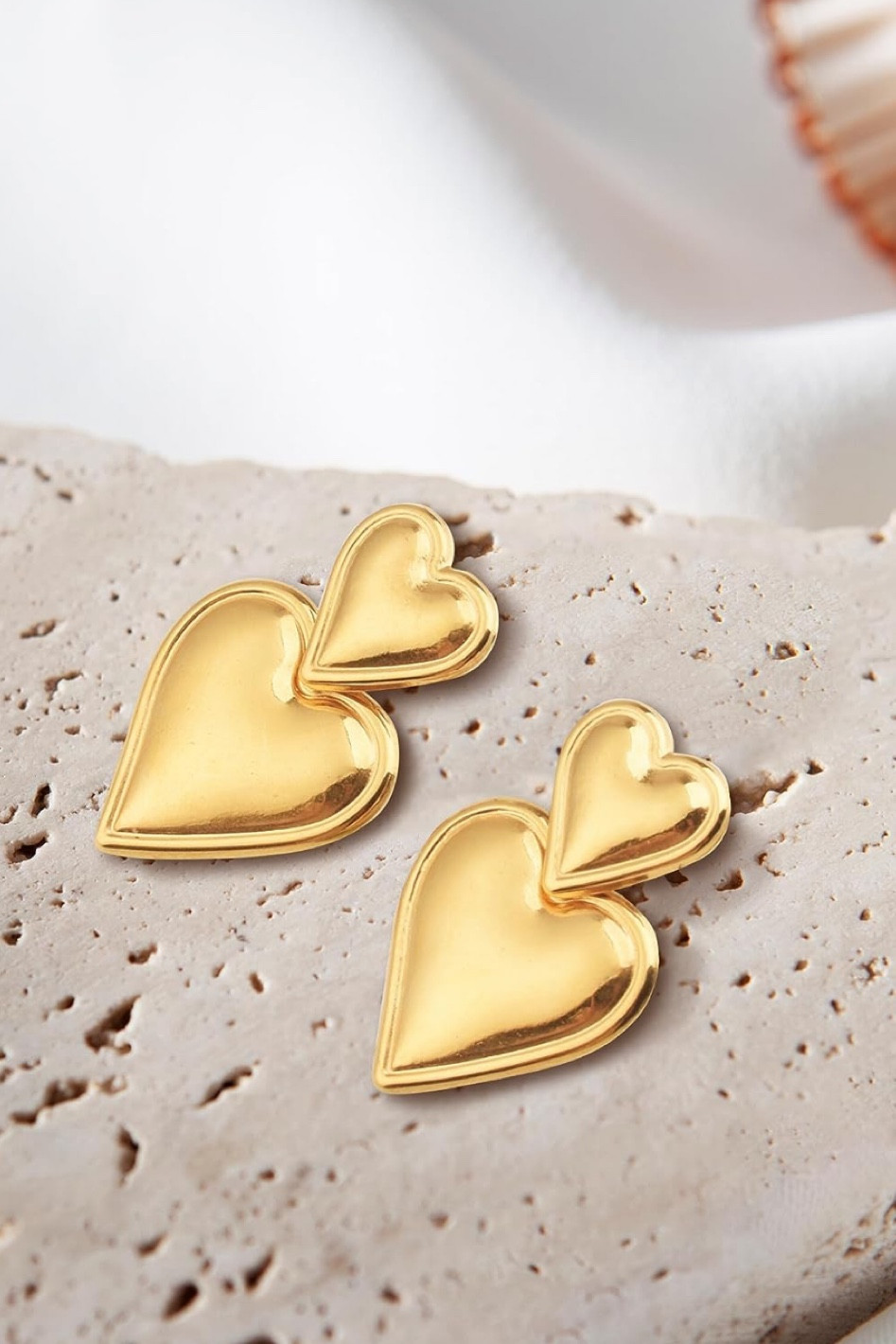 Heart shaped gold earrings to elevate any outfit 

#LTKunder50 #LTKFind #LTKstyletip