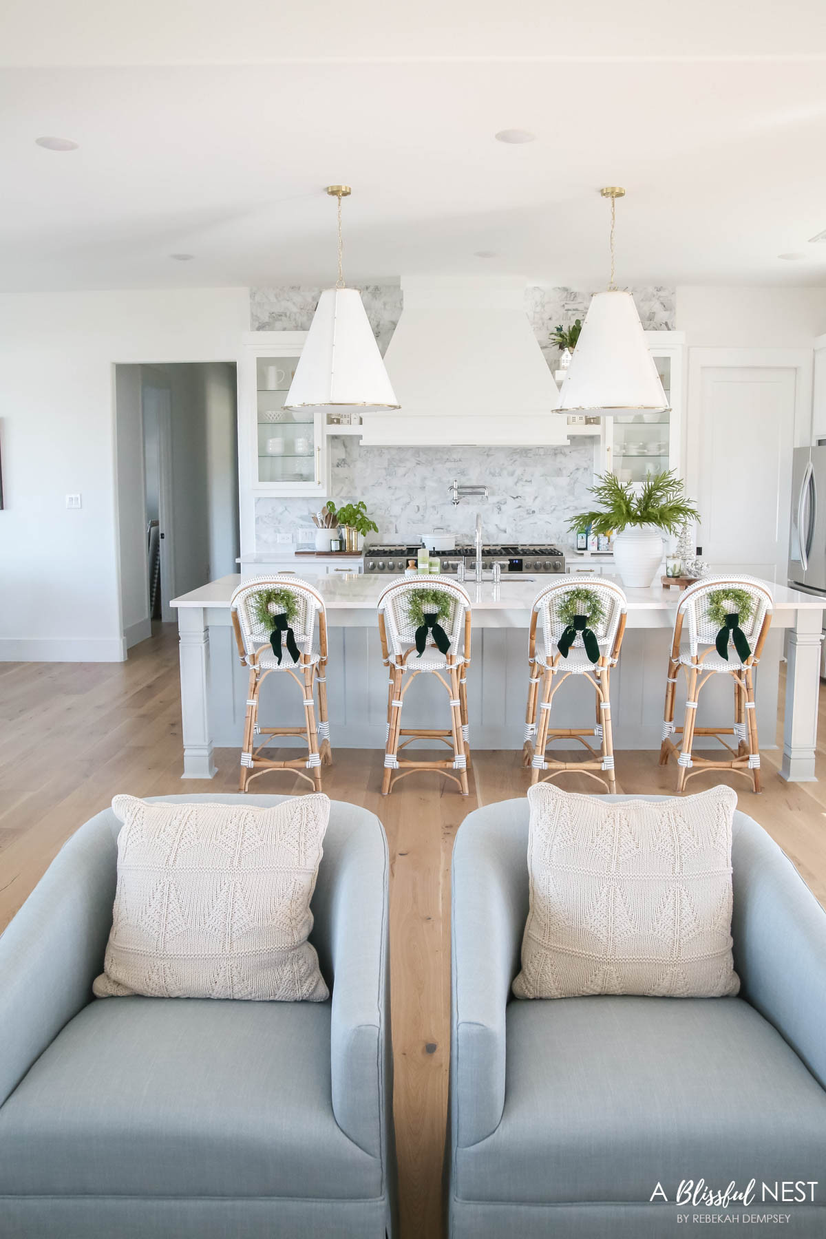 I loved how my kitchen looked last Christmas with these tiny wreaths adding the perfect festive charm.
wooden spoons, bamboo dish scrub brushes, Mrs. Meyer's kitchen set, European mill, illuminated mercury Christmas trees, artificial Norfolk pine branches, suede velvet ribbon, faux juniper wreath, textured ribbed vase, Thymes Frasier Fir candle, Mud Pie utensil holder, Christmas village houses 

 #LTKHoliday #LTKSeasonal #LTKHome