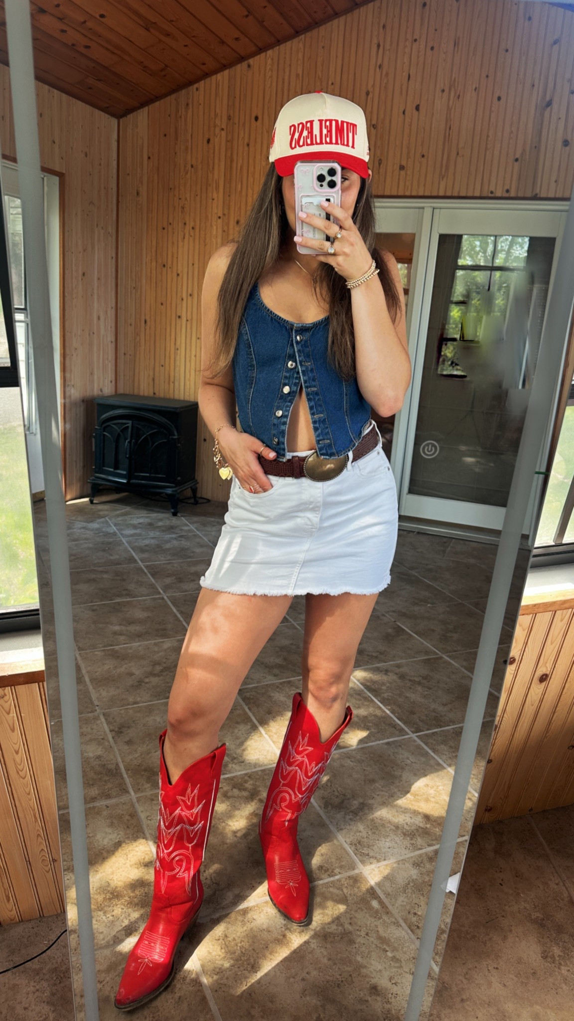 country concert outfit inspo !!  // trucker hat // cowgirl boots // red cowgirl boots // denim vest // western // western outfit // summer outfit // ootd // womens fashion // style // nashville outfit // festival outfit // spring outfit // denim // white denim skirt // country outfit // cowgirl boots outfit 

#LTKStyleTip #LTKFindsUnder50