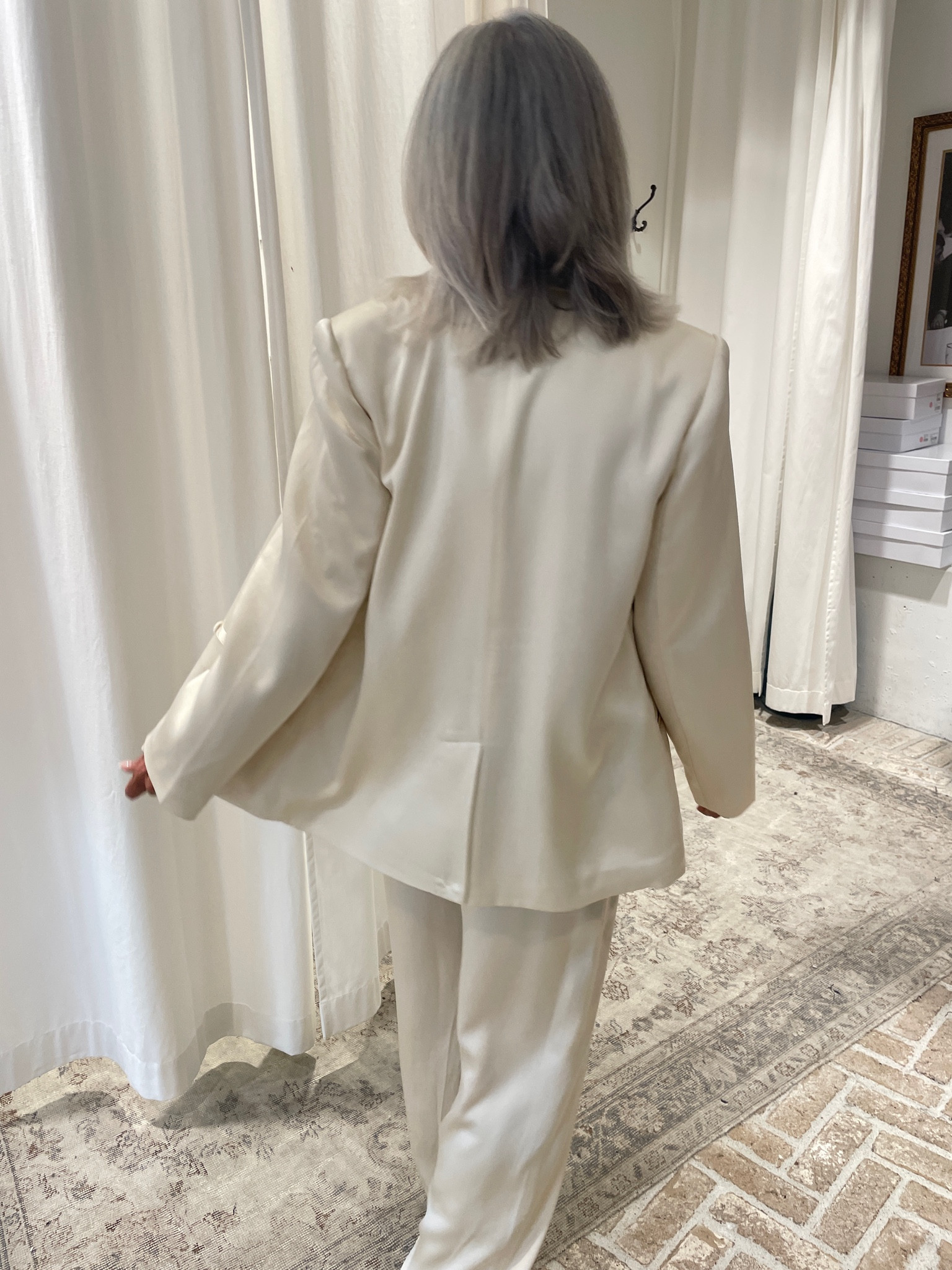 A silk anine bing blazer will always play. Barbi would wear this as set with the trousers for any event, or with a pair of jeans and sneakers all year long  