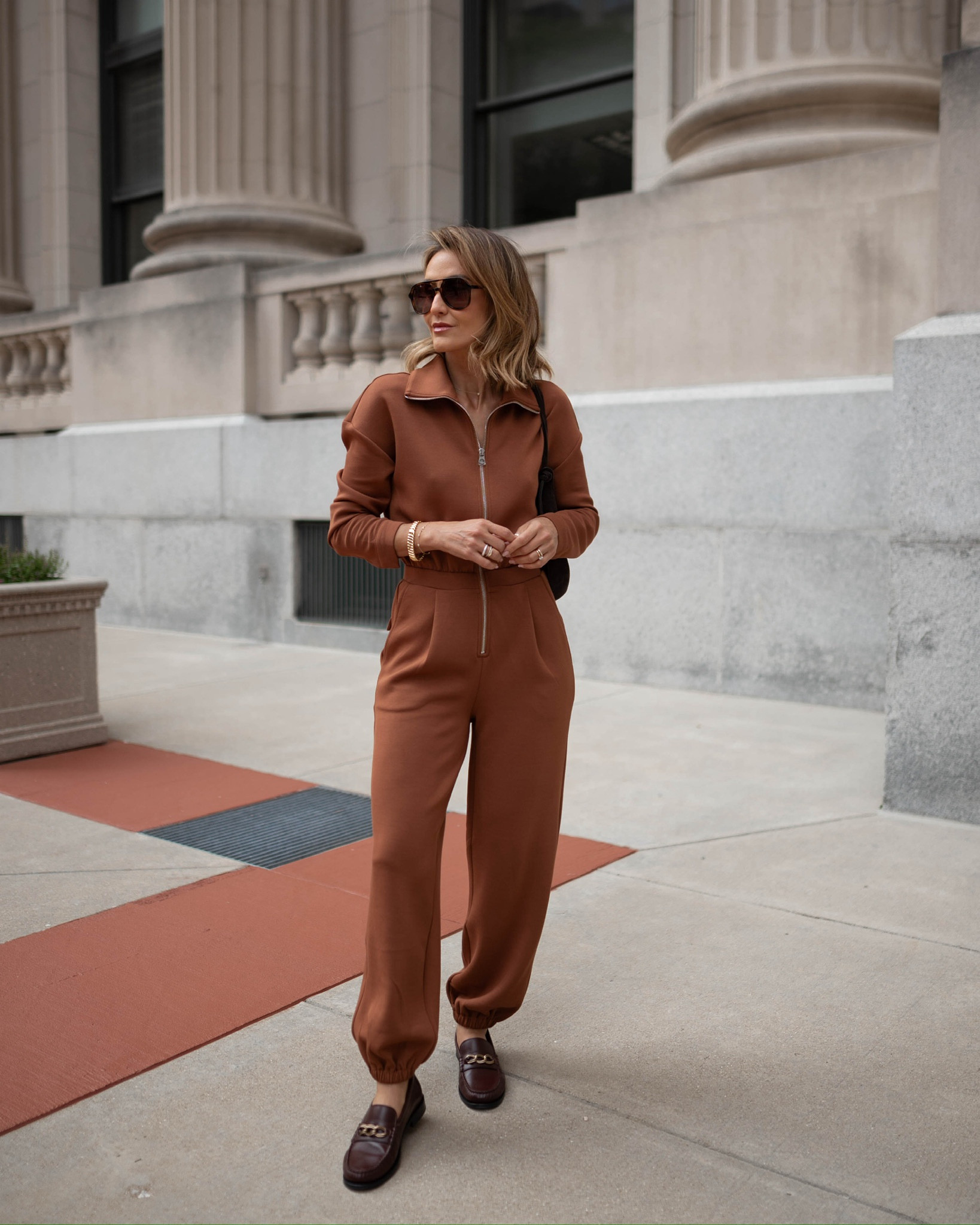 Whether you’re looking for an easy-to-throw-on fall outfit or you want something comfy to wear while traveling, this jumpsuit is the perfect fit.  Few pieces are as simple yet elevated, and I love that this look takes the guesswork out of getting ready. Fits TTS and would look chic with sandals or sneakers as well! 

#LTKSeasonal #LTKTravel #LTKStyleTip