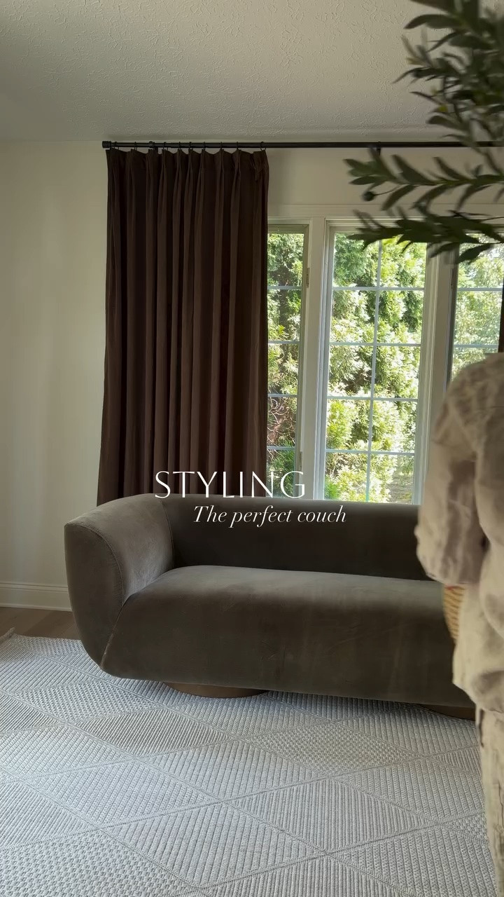Found the perfect couch from @allmodern #couch #olivegreen #velvetcouche #cozyaesthetic #naturalhome 

Couch: @allmodern 
Rug: @costco 
Side table: @target 
Olive tree: @amazonhome 
Curtains: @twopagescurtains