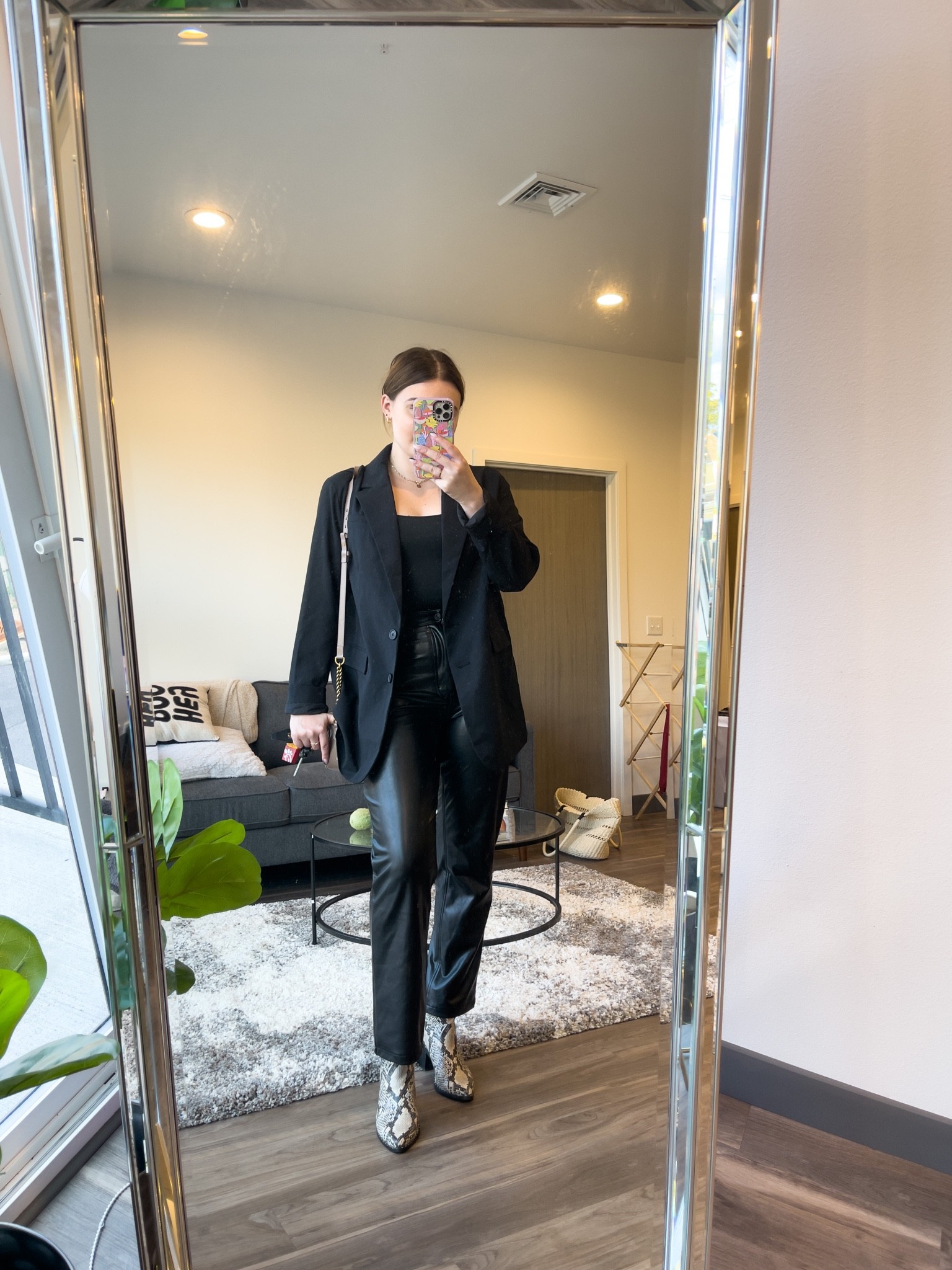 Edgy business casual outfit for networking or the office! Featuring the best leather pants ever

I’m wearing a L blazer, a M tank, size 31 pants and size 9 boots

#LTKHoliday #LTKstyletip #LTKSeasonal