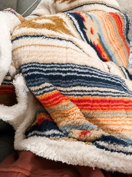 wrapping up in all of the fall vibes with my new blanket for the season.  this sherpa blanket with the southwest color palette and pattern was just calling out to me  

#LTKSeasonal #LTKhome #LTKHoliday