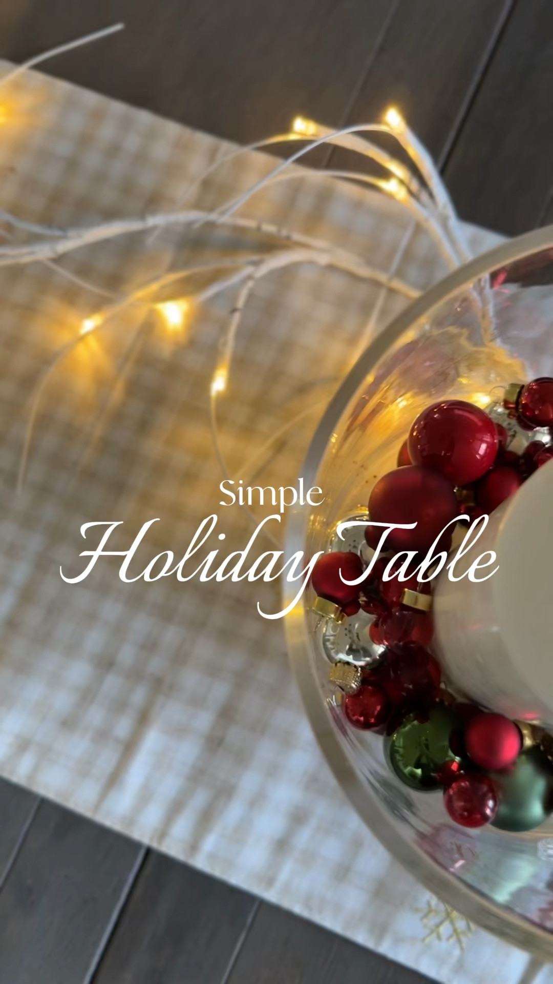 Create a simple and easy holiday Tablescape or centerpiece with just a few items. 

For the dining room table, which is a rectangular dining table, I simply:

1. Started with a holiday table runner 
2. Used an LED birch branch Garland strange to add a natural element as well as soft lighting
3. Placed glass Hurricanes at either end with a tall pillar candle
4. Filled the hurricanes with mini Christmas ornaments in traditional red and green colors

Holiday decor // holiday dining room // Christmas decor inspo // glass ornaments // minim glass ornaments // DIY Christmas 

#LTKhome #LTKVideo #LTKHoliday