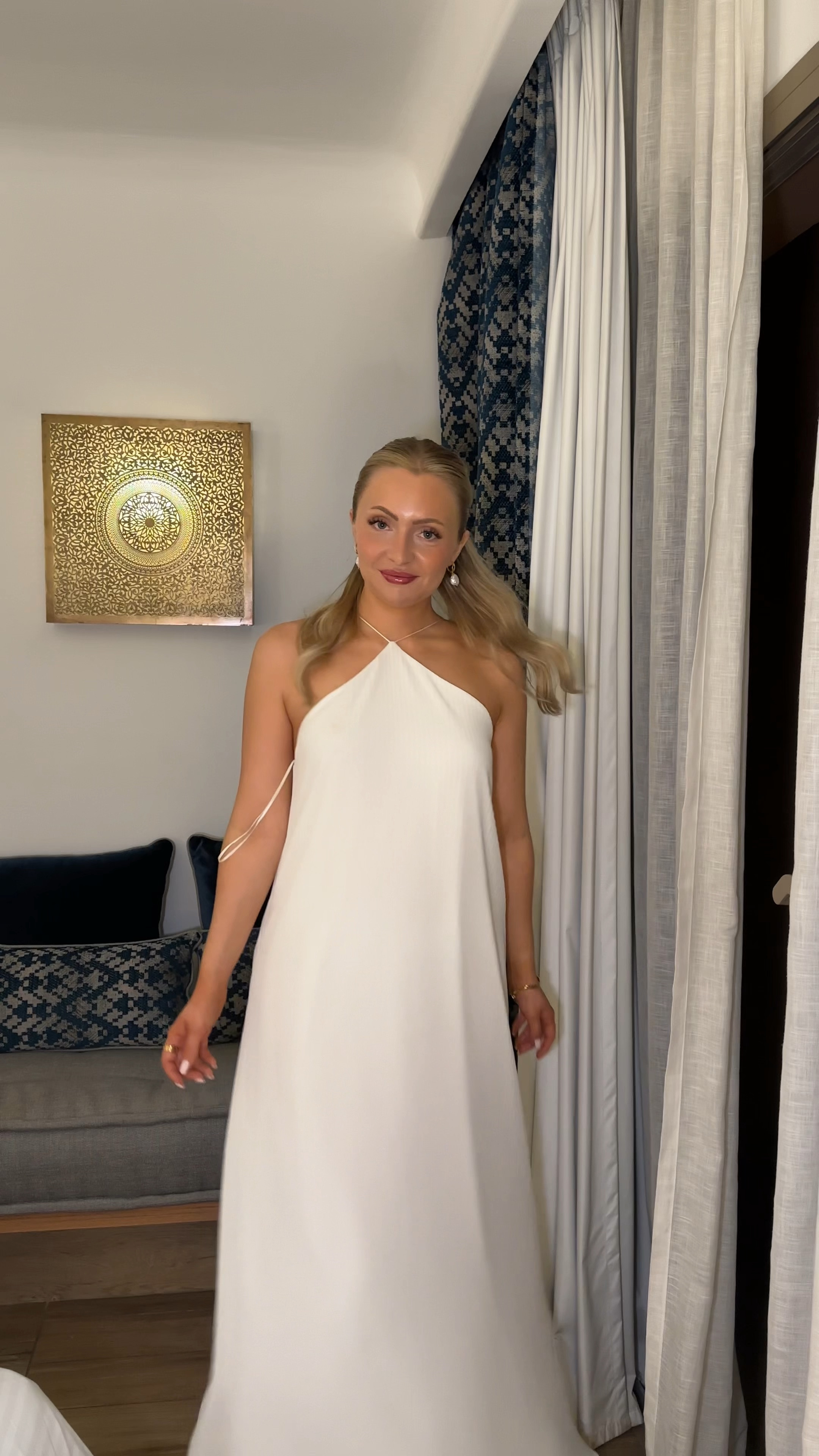 Marrakech, Morocco 2024 - Night 1 outfit 🌴🇲🇦Flowy pleated white halter neck maxi dress by Vesper. 

#LTKfindsunder100 #LTKtravel #LTKeurope