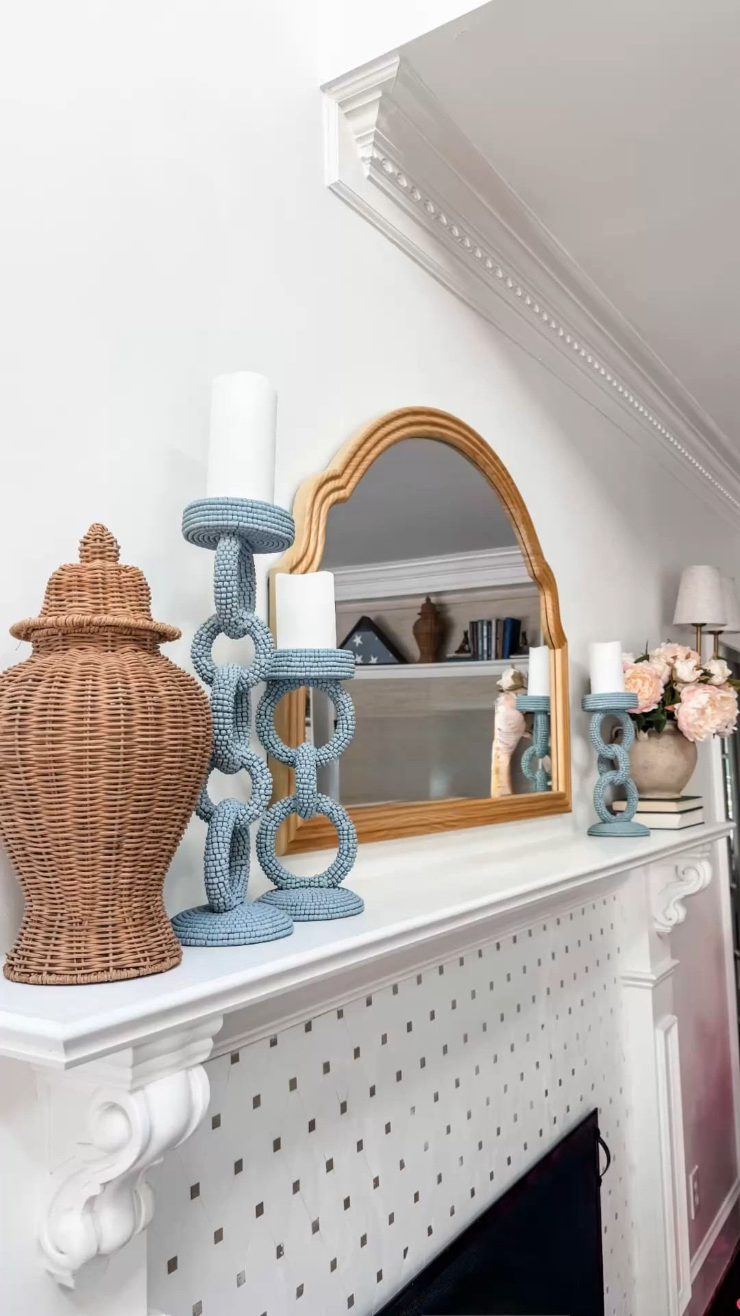 This is the perfect mix of high low Design. We paired Serena & Lily candlesticks with a Wayfair bamboo mirror and rattan woven ginger jars from At Home.