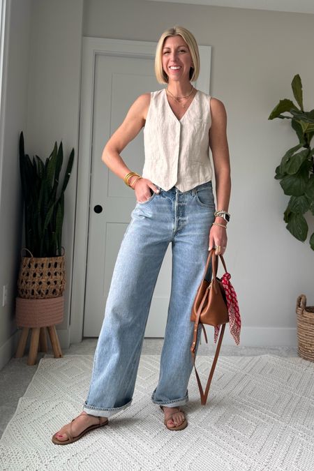 Baggy jeans are perfect for the summertime because they easy and breezy! I love cuffing them to pair effortlessly with some simple sandals. Balance out the bagginess of the jeans by adding a fitted linen vest for an everyday look

#LTKOver40 #LTKStyleTip #LTKSeasonal