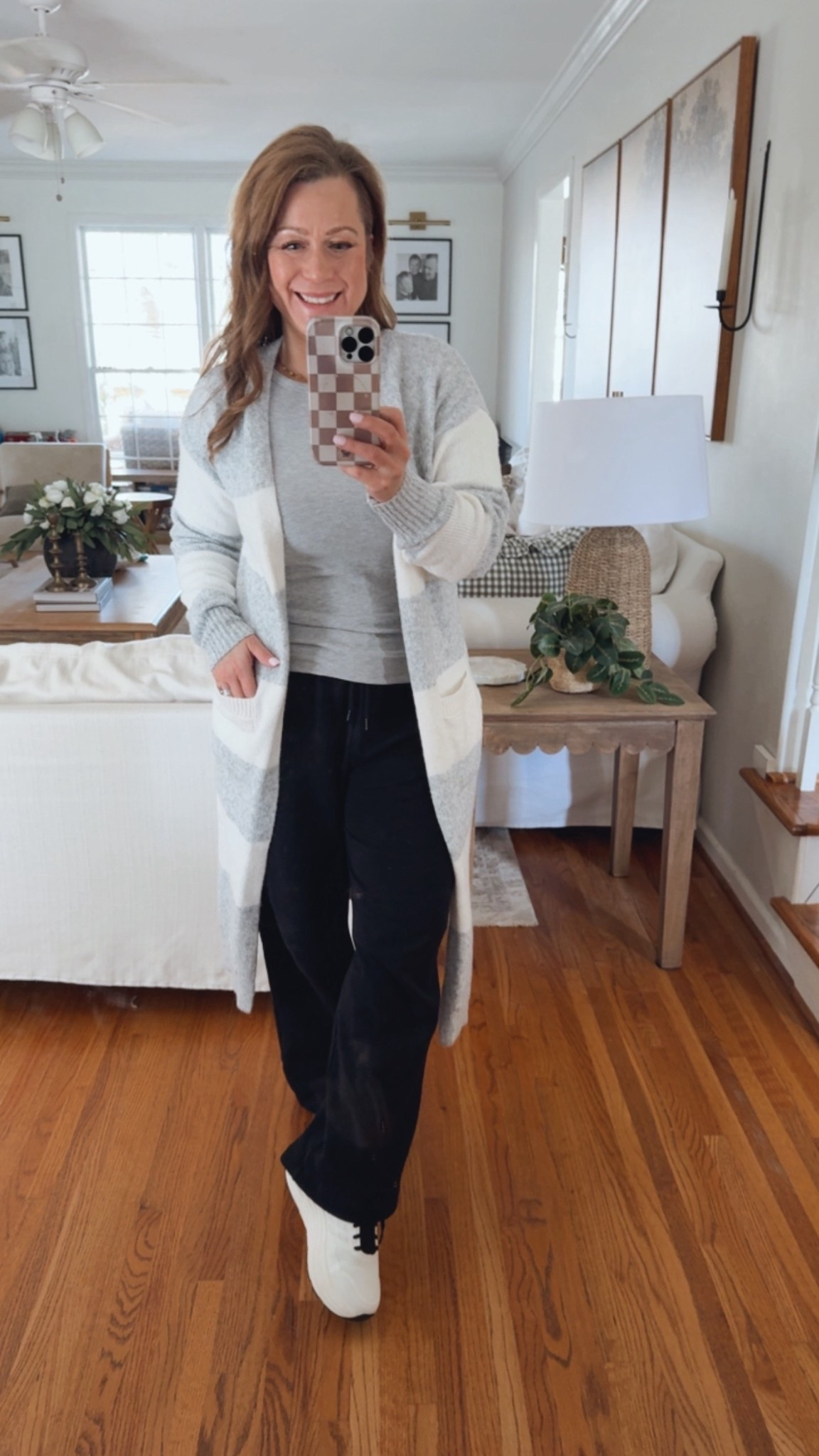 Today’s cozy and comfy OOTD on this super cold day 

Stripe long duster cardigan 
Wide leg sweat pants 
Everyday essential Long sleeve top 
Most comfy sneakers 

#LTKMidsize #LTKootd #LTKPetite
