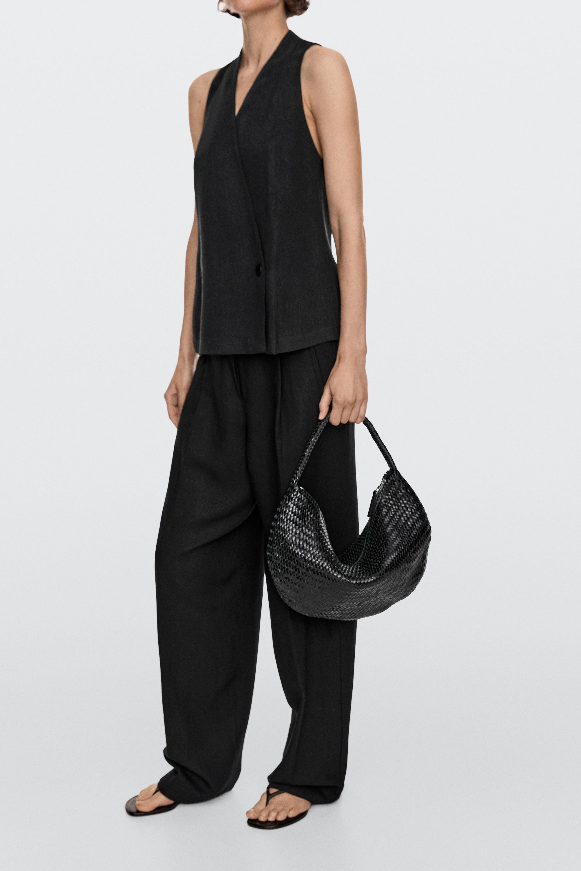 NEW VIEW LOOK
Braided leather half-moon bag
    
 £299  Colour:  Black  +2  Add to basket | Massimo Dutti UK