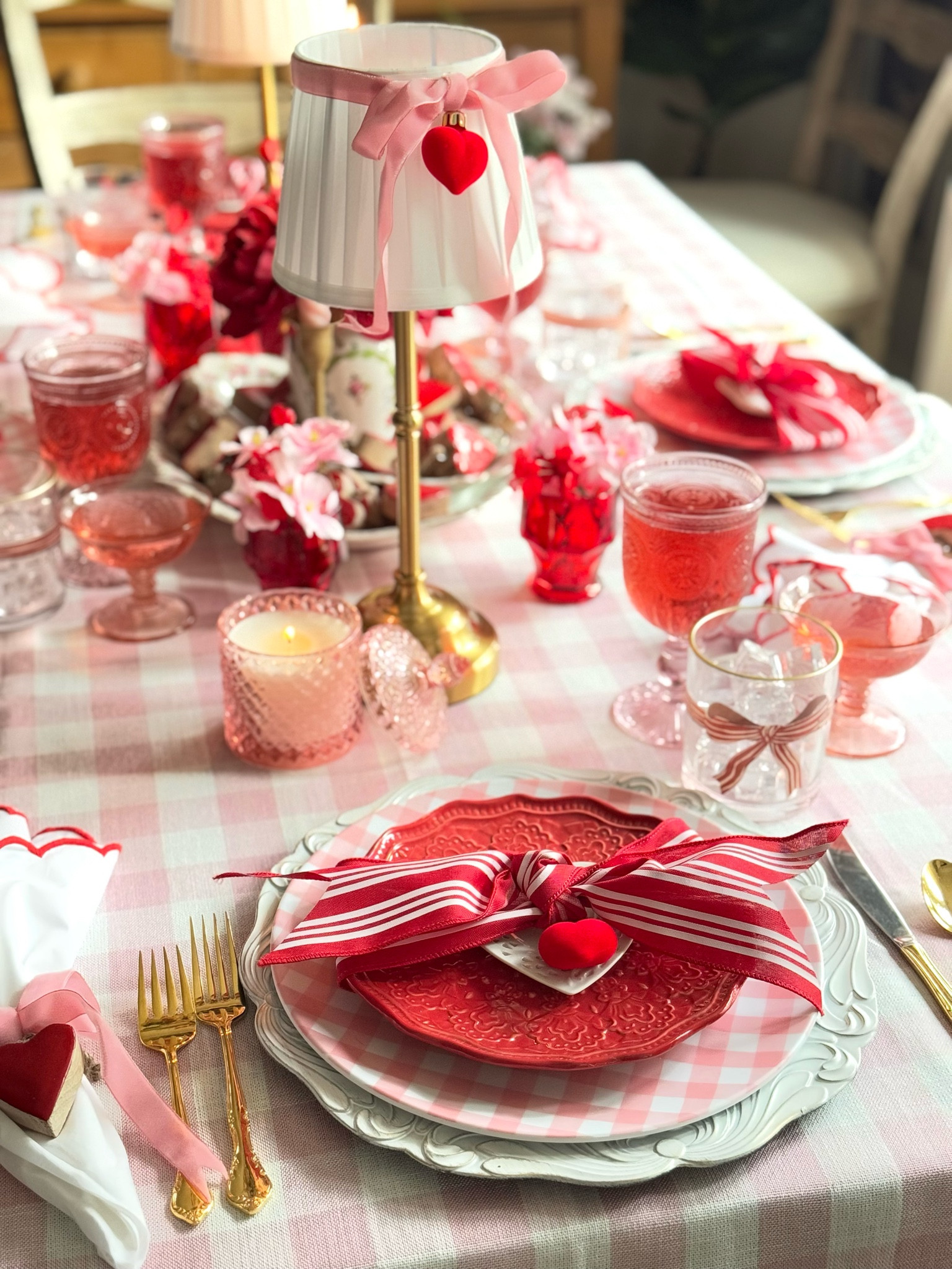 Style the Perfect Pink & Red Valentine’s Table 💖

Dreaming of a romantic Valentine’s tablescape? This pink and red setup is full of layered charm—from gingham plates and scalloped napkins to vintage-inspired glassware and the prettiest hanging heart chandelier decor! 🌸❤️

I’ve linked all the details so you can bring this cozy, elegant look to your home! Tap to shop and create your own dreamy Valentine’s table. ✨

#LTKhome #LTKSeasonal #ValentinesTablescape #ValentineTableDecor #PinkAndRed #GrandmillennialStyle #TablescapeInspo #EntertainingAtHome