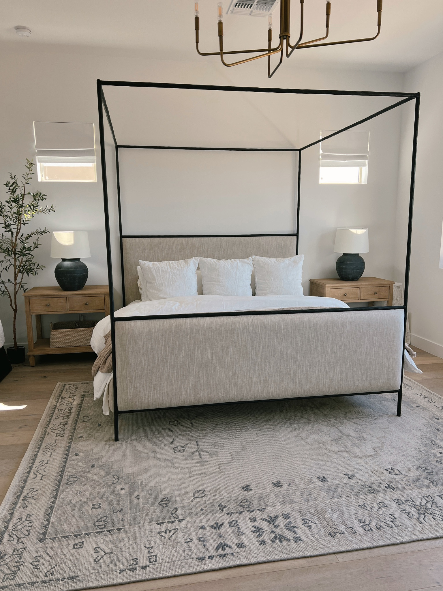 Primary bedroom. Canopy bed. Pottery barn nightstands and rug! 

#LTKhome #LTKunder100 #LTKunder50