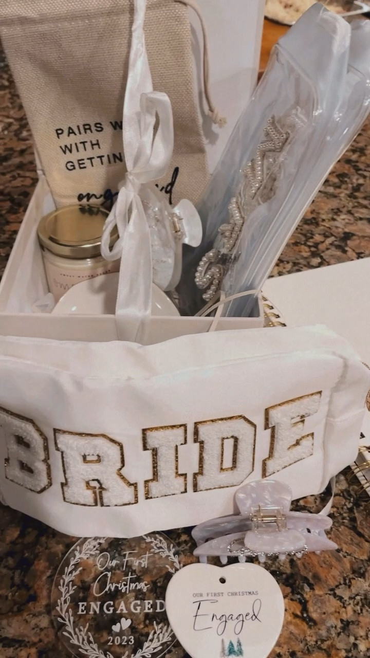 Bride to be basket 🤍🥂 Another sweet gift from one of my best friends #engaged💌 #engagementgift #bride #bridetobe 

-Everything in the box is from amazon-

#LTKGiftGuide #LTKwedding