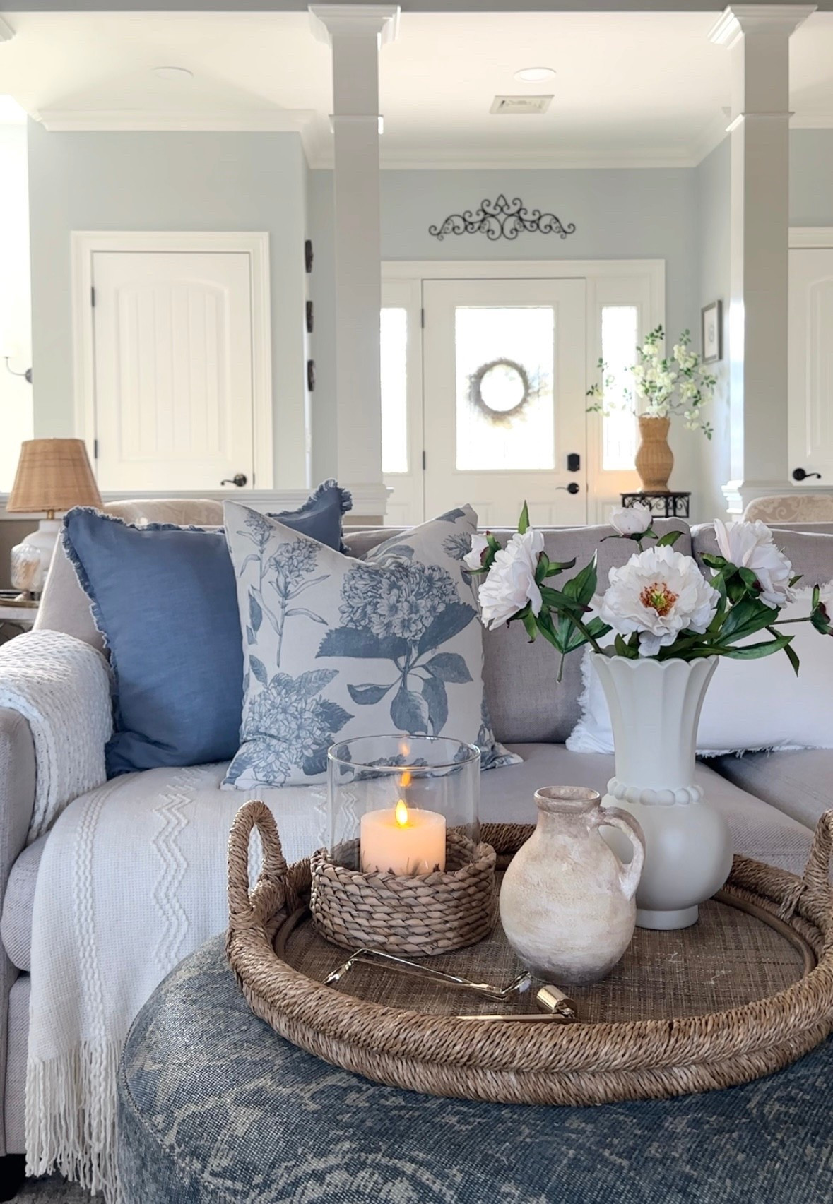 Amazon blue pillows, throw blanket, vase, florals, hurricane candle holder, rattan vase, sofa, trays, spring wreaths. Walmart, Pottery Barn, Target. 

#LTKHome #LTKSaleAlert #LTKdayinmylife