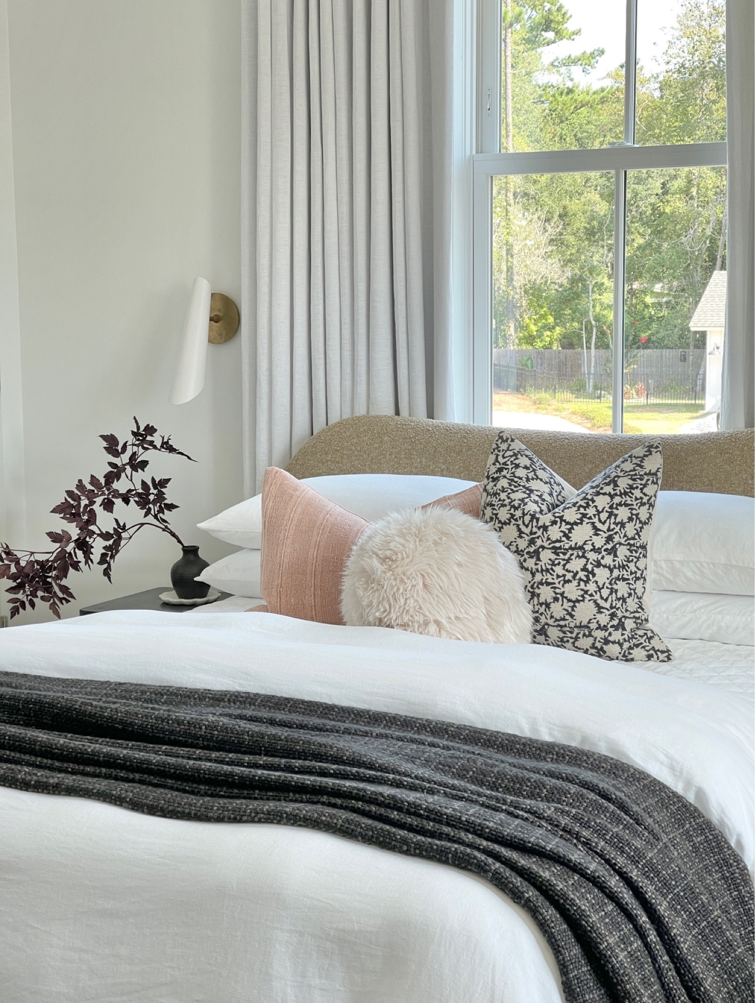 Bed pillows, black throw blanket, black and white floral pillow, bedroom, bedding, bedroom decor, white and brass sconce, boucle furniture, boucle chair, fall florals, fall decor 

#LTKFind #LTKSeasonal #LTKhome