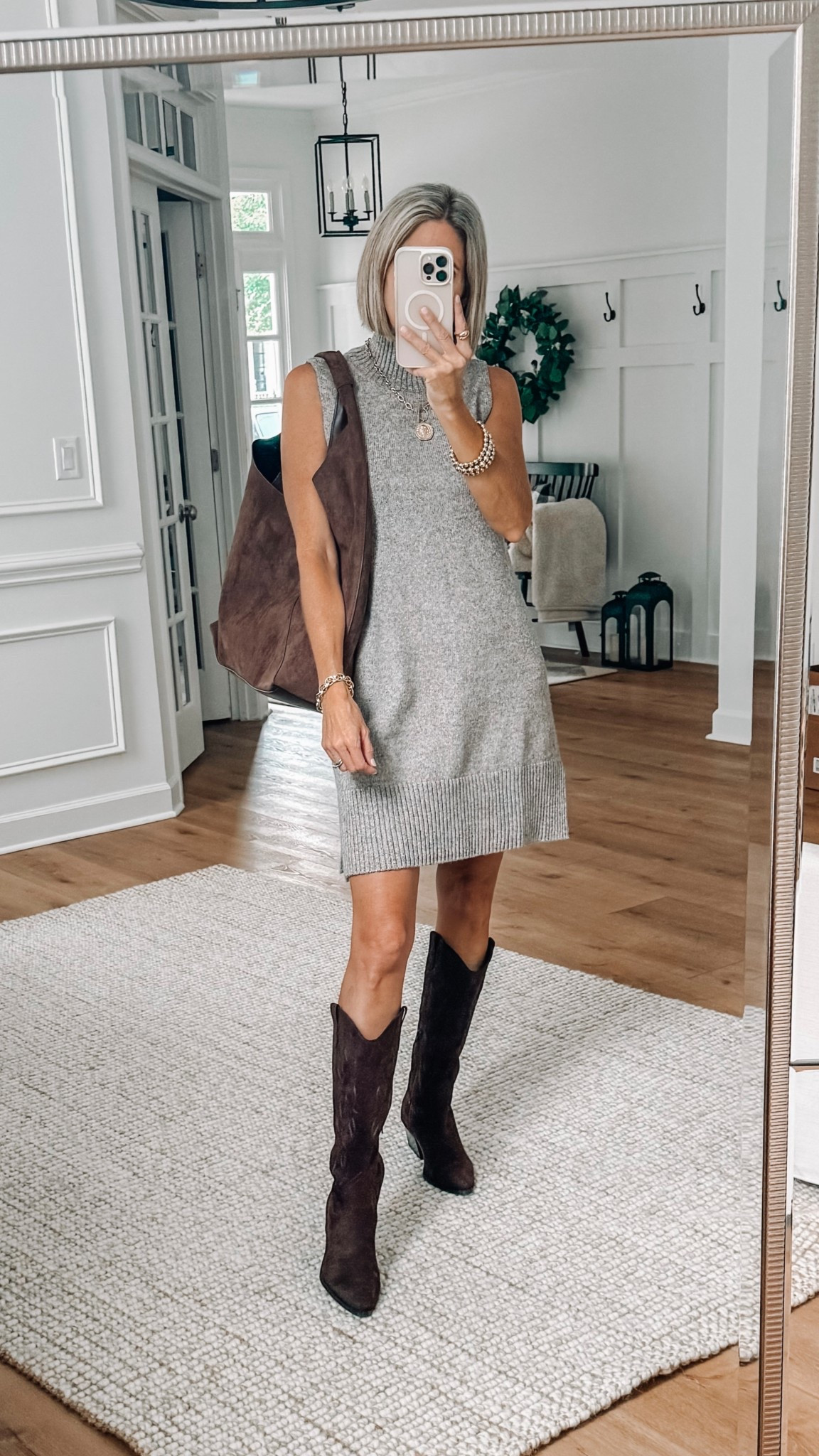 🍁 This sleeveless sweater dress is such a chic staple — soft, affordable and so easy to style. I paired it with these tall boots for a cozy fall vibe 🤎 comes in other colors too. Throw on a blazer and take it right through winter. Wearing a small

#WalmartFashion #FallStyle #LTKFall #LTKSeasonal #WalmartFinds

#LTKFindsUnder50 #LTKSeasonal #LTKOver40