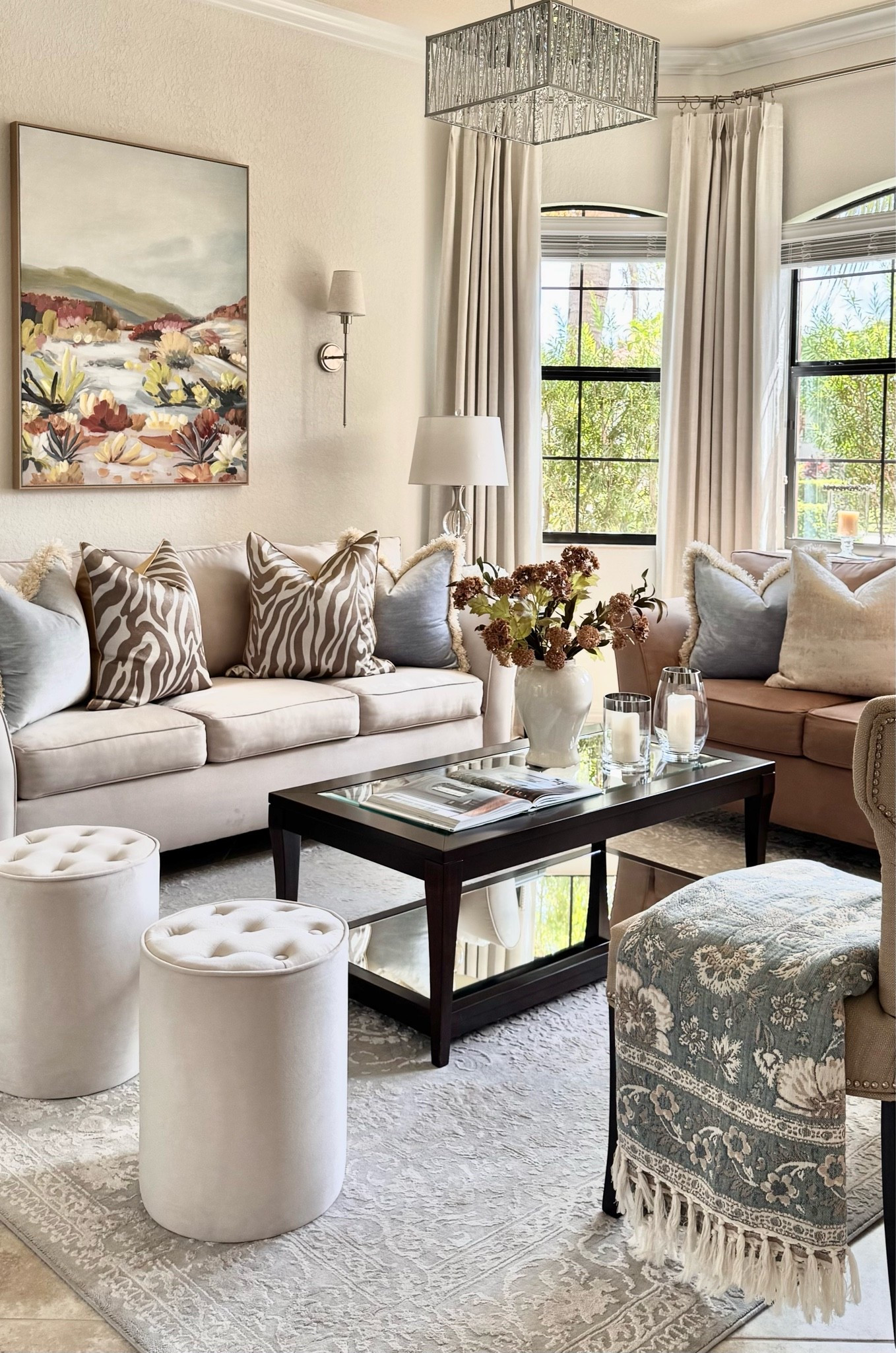 Our cozy & layered living room decorated with beautiful warm neutrals and subtle touches of blue!🤎🩵

Fall Decor | Transitional Decor | Modern Decor | Traditional Decor | Southern Decor | Neutral Decor | Autumn Decor | Fall Stems & Florals | Coffee Table Styling & Accessories | Seasonal Decor | Home Decor | Fall Centerpiece | Drapes | Rug | Wall Sconces | Coffee Table Book

#LTKHome #LTKSeasonal #LTKgrwm
