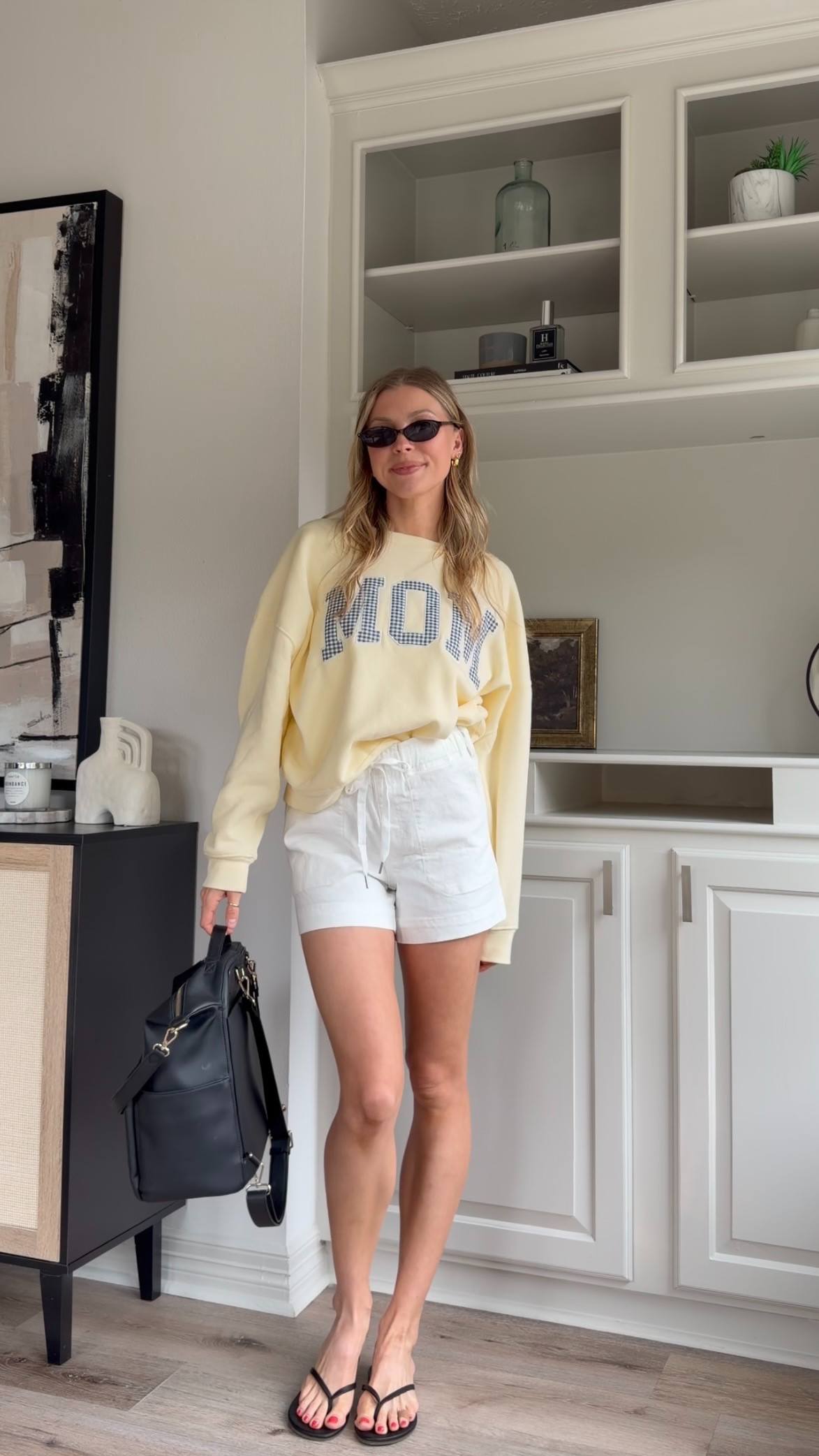 Cute, comfy mom ootd | L in sweatshirt, S in shorts  

 