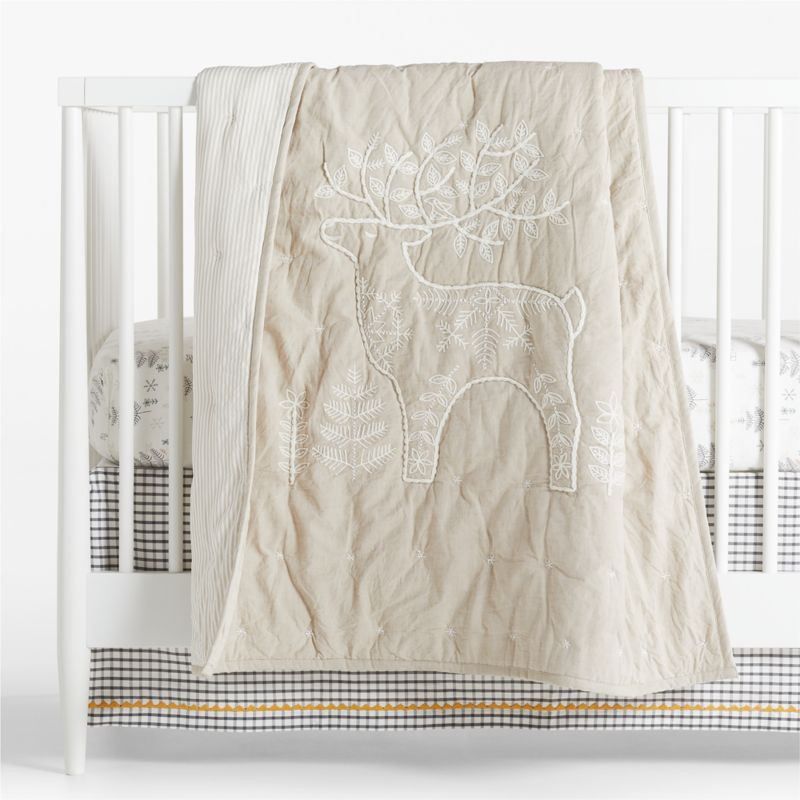 Nordic Christmas Deer Organic Cotton Baby Crib Quilt | Crate & Kids | Crate & Barrel