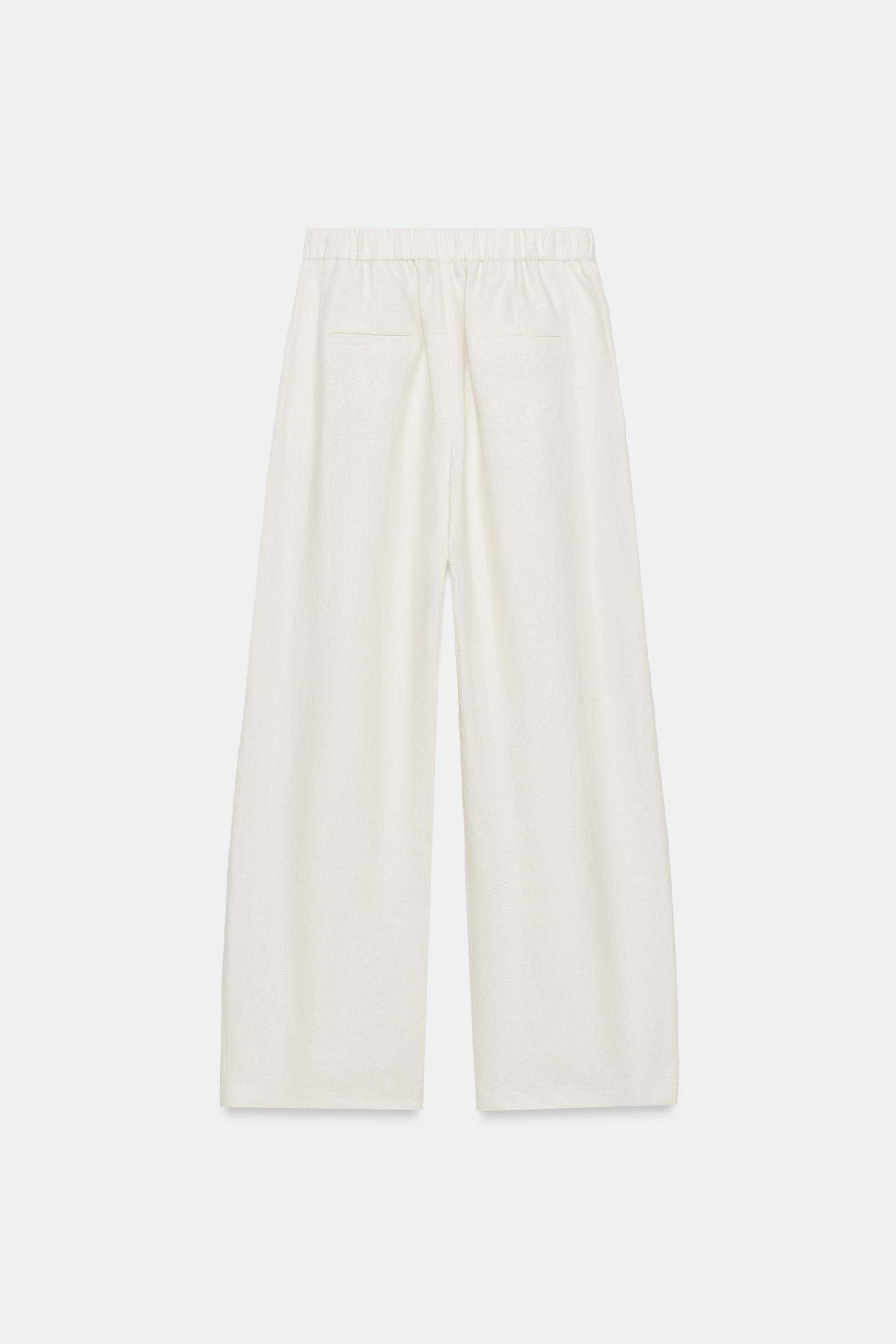ZARA WOMAN COLLECTION. Trousers made from linen yarn. Mid-waist with an adjustable elasticated wa... | Zara UK