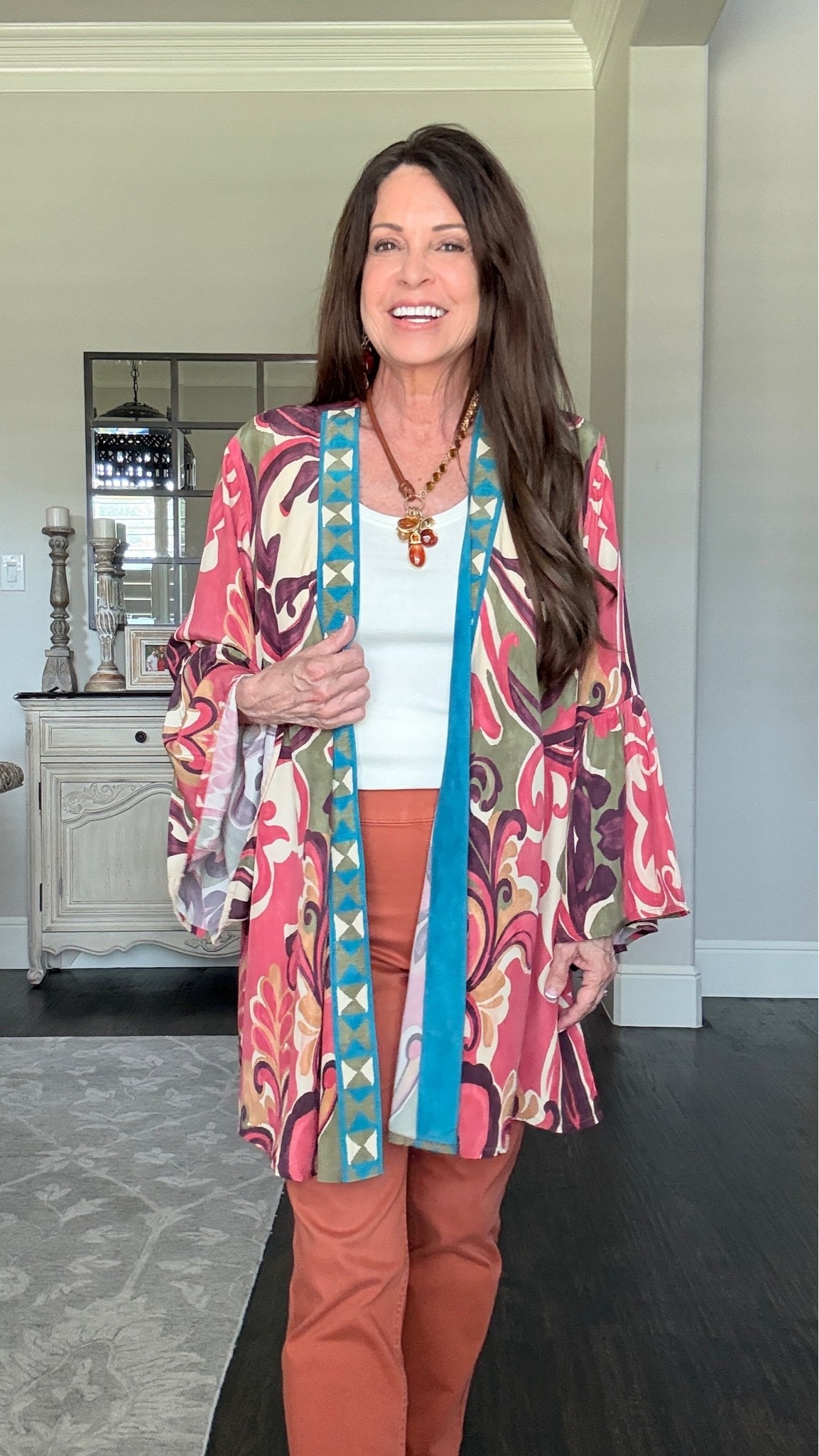 Layering pieces to wear now as we transition into the Fall season include tanks, slim jeans in a clay color and muted colored kimono. Available in misses, petites and women’s sizing.

#LTKOver40 #LTKTravel #LTKSeasonal
