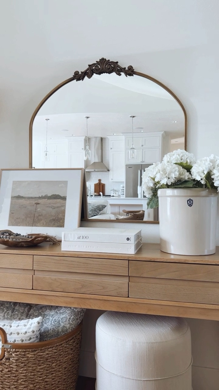 I decorated my Target Studio McGee console table with an oversized crock from Amazon filled with faux hydrangeas, artwork, books and a wooden dish  

#LTKstyletip #LTKhome #LTKSeasonal