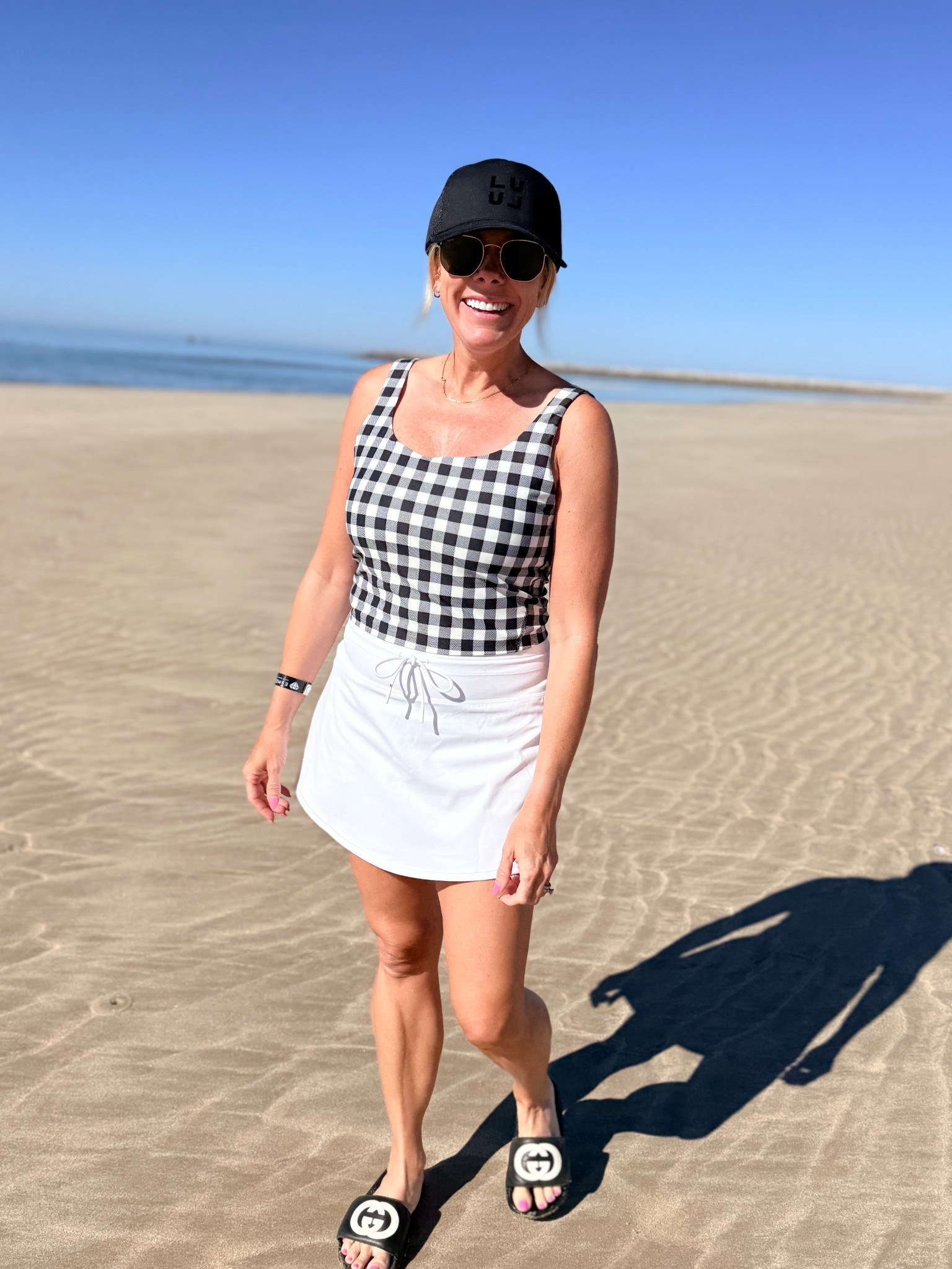 Gingham long line sports bra size medium. Small @Vuori US skirt. Lululemon hat  

#LTKActive #LTKSwim #LTKootd