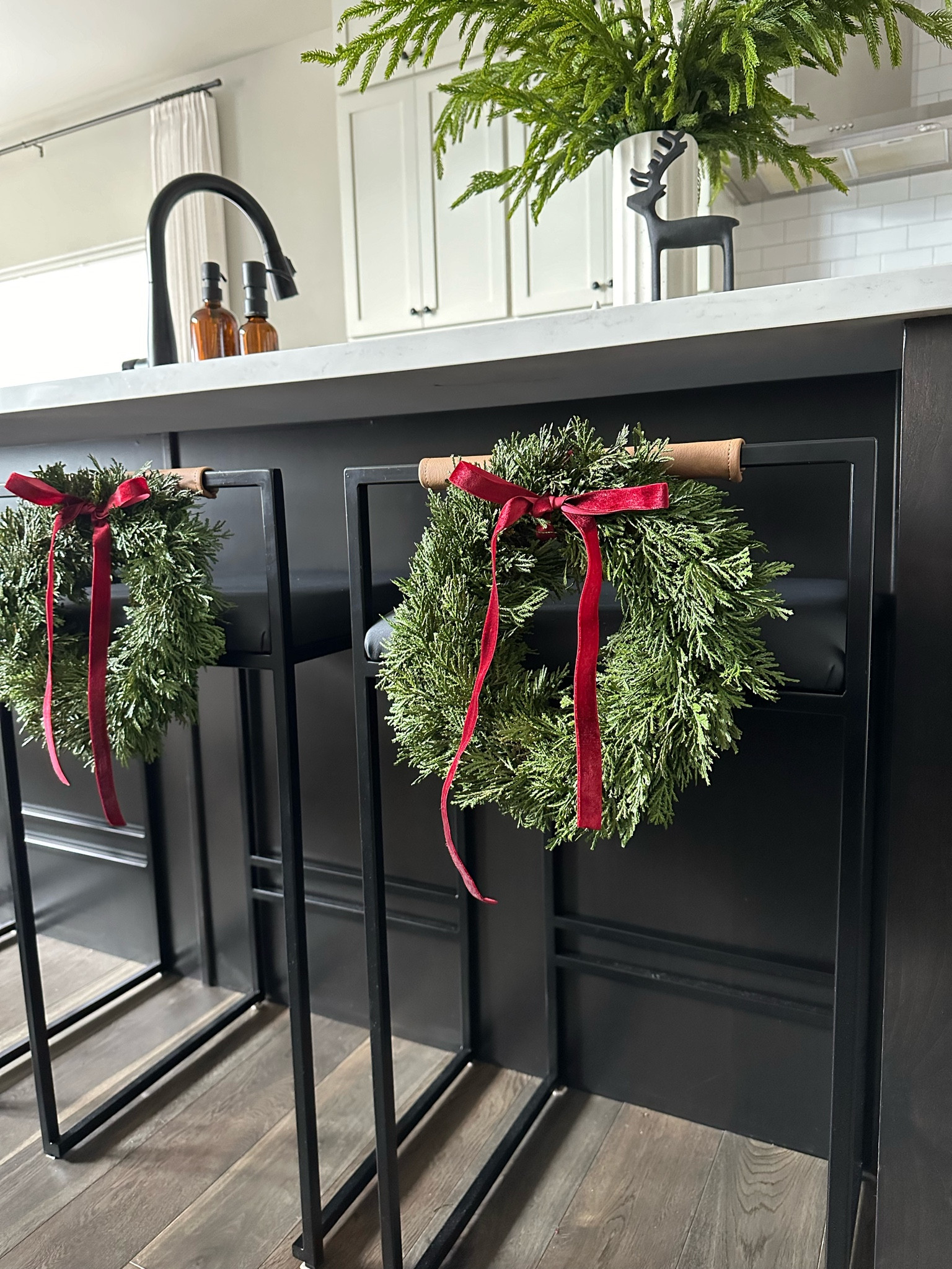 Adding wreaths to bar stools is an easy way to make your kitchen festive! 

Home decor, Christmas decor, Christmas wreath, Christmas kitchen, ribbon 

#LTKHoliday #LTKSeasonal #LTKhome