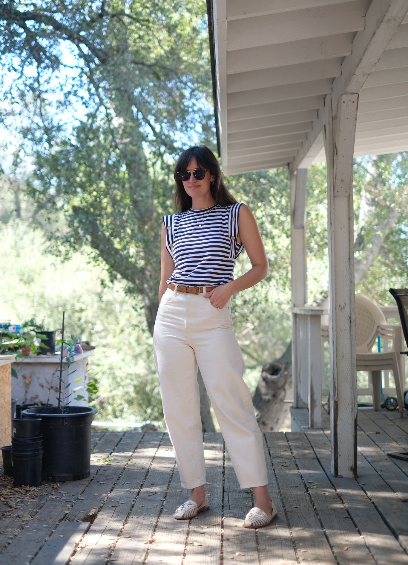 Elevated basics like a statement tee are the missing piece to a lot elevated casual capsule outfits. The strong shoulders and gold accent buttons on this striped tee add so much intention to a simple look. And I’m still crushing on my Saint + Sofia Barrel Jeans. They’re the perfect subtle gateway to this denim trend. Follow their sizing chart for the right fit. Brltbis thrifted vintage and Jewelry is Sela Designs code: ALEX10 #barreljeans #stripedtee

#LTKSeasonal