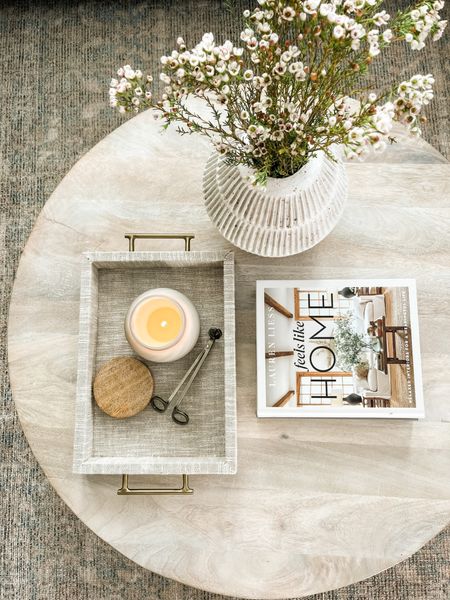Simple coffee table styling, spring coffee table decor, neutral decor, coffee table books. 

#LTKhome #LTKunder50 #LTKSeasonal