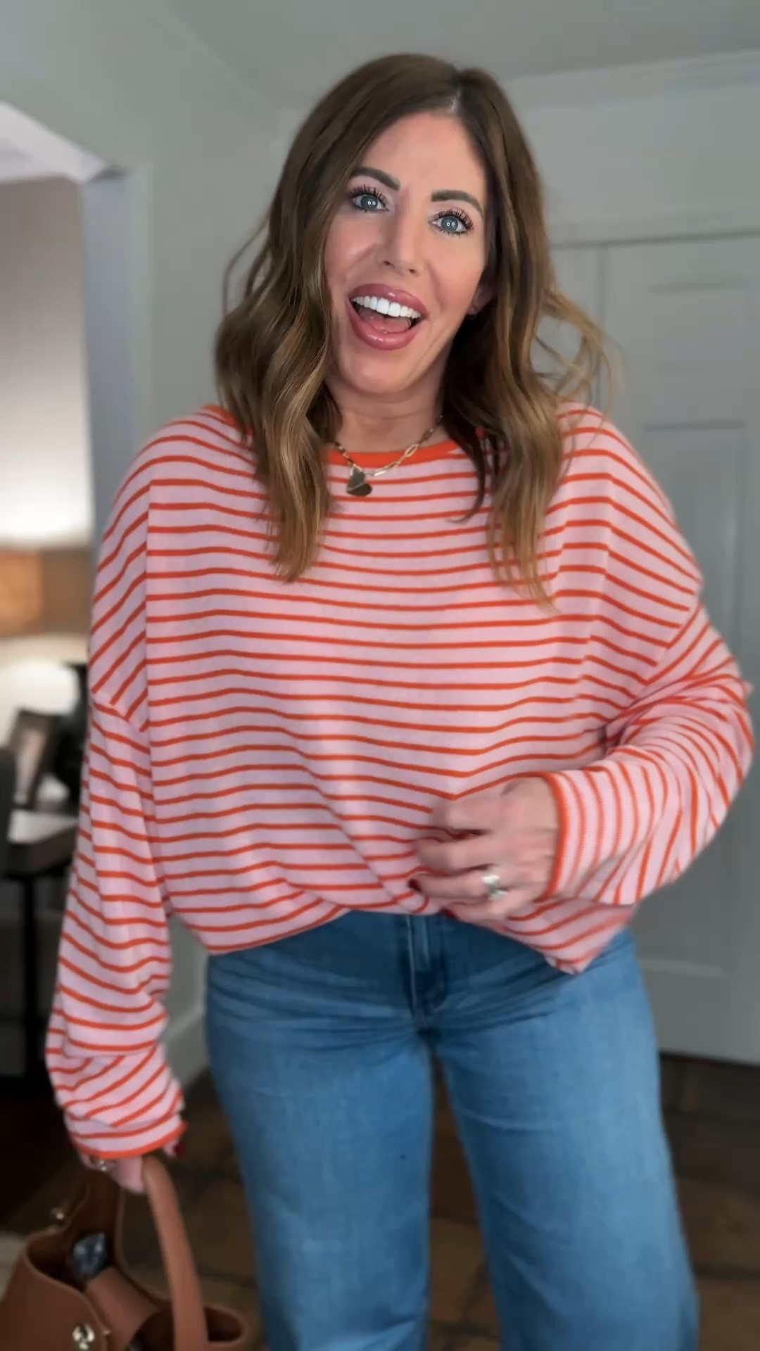 Linen blend oversized, long sleeve striped sweater from Amazon. It has a wide boat neck with raw hem details at the sleeves.!it’s stretchy and lightweight; perfect to wear now and into spring and even summer! it comes in a few other colors, but I love this pink and orange stripe. This would be so cute with linen pants or shorts as the weather warms up. I sized up to a large because I wanted it to be really oversized.

I’m wearing it with the high-rise wide leg jeans from @onequince they are very similar to a very high-end pair but these are only $50. They have the perfect amount of stretch so they’re super comfy and they’re very flattering they come in for length options. I’m wearing a 29/34 inch inseam.￼



#LTKOver40 #LTKootd #LTKSaleAlert