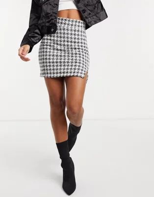 ASOS DESIGN mini skirt in houndstooth boucle with notch front | ASOS (Global)