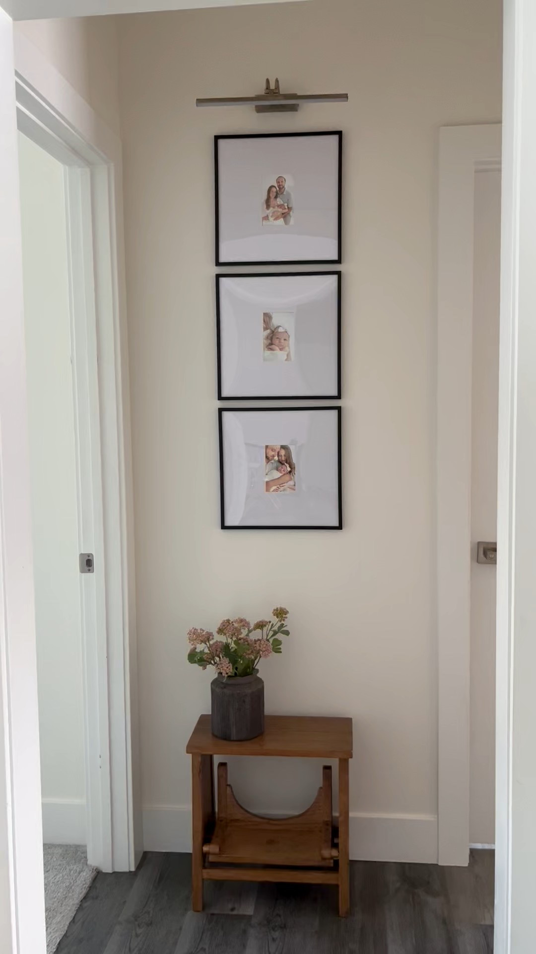 Just finished styling this little hallway! 😍 
Details >>
• Gallery wall picture frames: Americanflat Picture Frame with Polished Plexiglass 14x14 with 4x6 photo and black frame.
• Picture light: Cordless 16" Picture Lights with Timer and Dimmable Lights, rechargeable battery with USB, in antique brass.
• Hearth and Hand with Magnolia arch step stool in aged oak.
• Vase: Dark brown rustic terracotta vase.
• Florals: Hearth and Hand with Magnolia faux blush pink sedum flower stems.
• Wall paint color: Sherwin Williams Greek Villa


Home decor
Hallway decor
Gallery wall
Home style 
Interior design 
 

#LTKHome