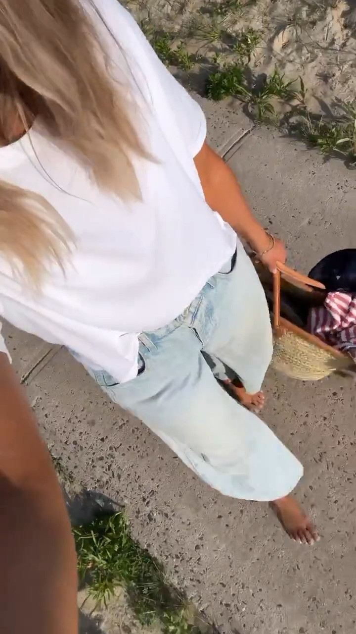 Casual beach spring day outfit idea! Wearing the perfect tee and my go-to beach bag 🤍

#LTKootd #LTKSeasonal