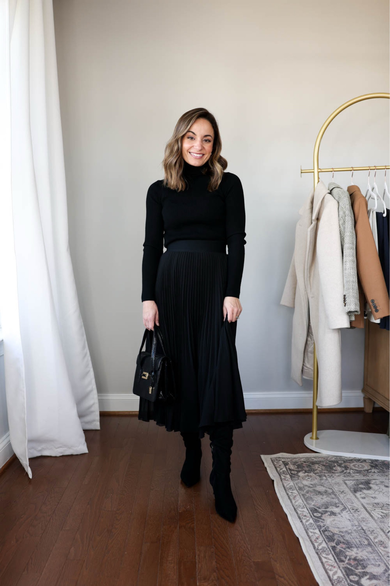 Winter workwear capsule series: black pleated skirt outfits

This capsule has 16 pieces (not including shoes and bags) and 30 outfits! 

Black turtleneck (aritzia): xs 
Black skirt (aritzia): xs 
Also linking a similar skirt from Amazon - I wear that skirt in small, link shows a green skirt, it also comes in black

My measurements for reference: 4’10” 105lbs bust, waist, hips 32”, 24”, 35” size 5 shoe. 25” inseam measurement to my ankle bone.

#LTKWorkwear