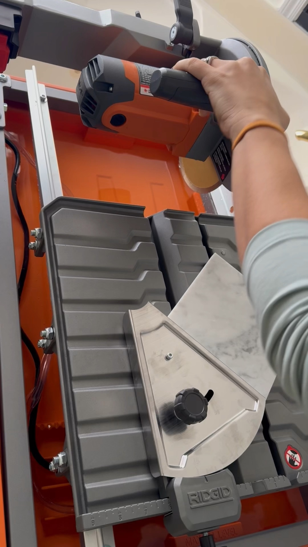 Tile saw with laser line, miter guide, and sliding base. 

#LTKVideo #LTKGiftGuide #LTKhome