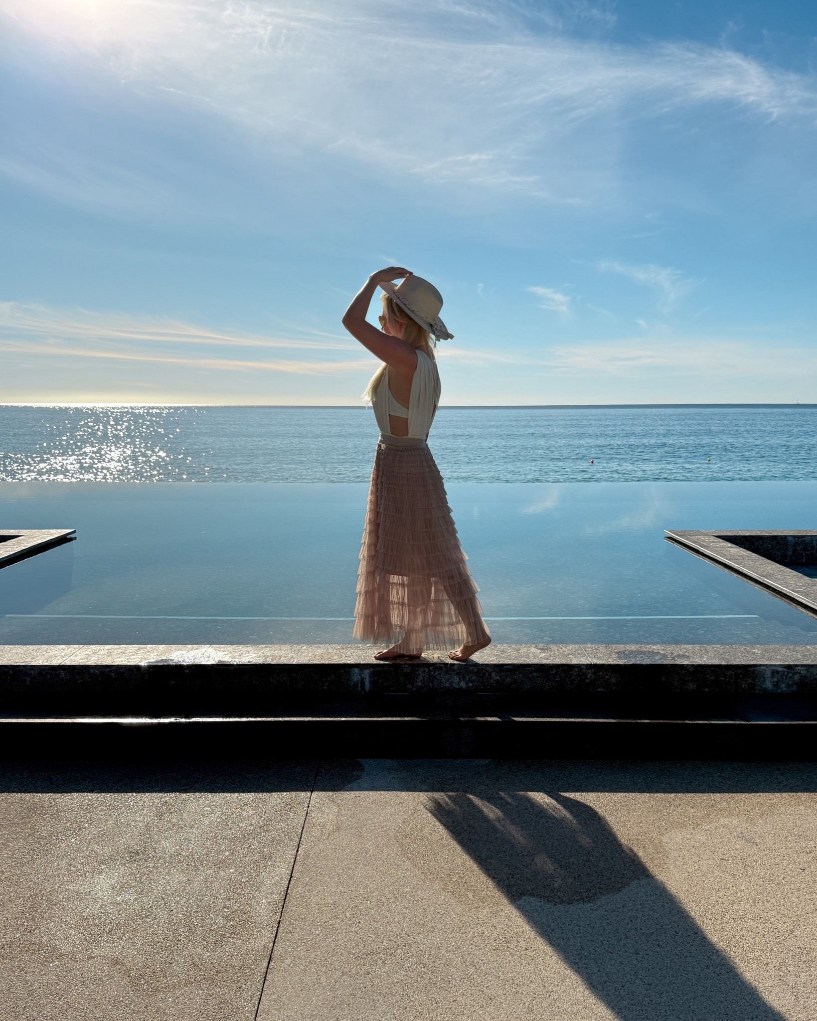The kind of Cabo outfit you live in all day 🤍
A classic white one-piece paired with a flowy skirt cover-up & straw hat is the perfect balance of elevated and effortless. Ideal for pool days, beach walks, and resort afternoons that turn into sunset cocktails without a full outfit change.

Cabo beach outfit, white one piece swimsuit, swim cover up skirt, resort pool outfit, beach vacation style, tropical swimwear look, Cabo resort wear, straw hat beach outfit, poolside outfit, Mexico beach vacation

 

 

#LTKTravel #LTKWedding